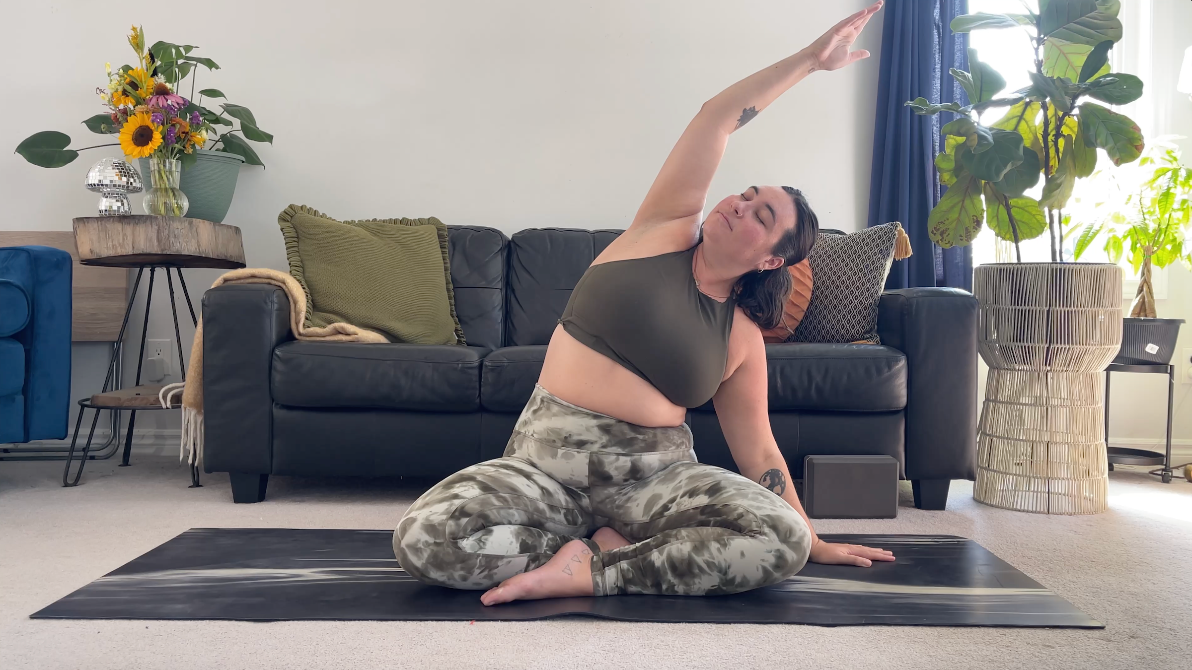 Yoga teacher Taylor Lorenz in Side Stretch, part of her yoga for back pain practice