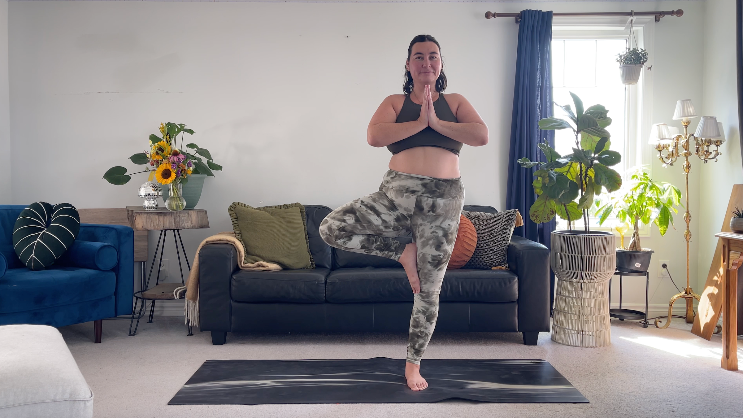 Yoga teacher Taylor Lorenz in Tree Pose, part of her morning yoga practice
