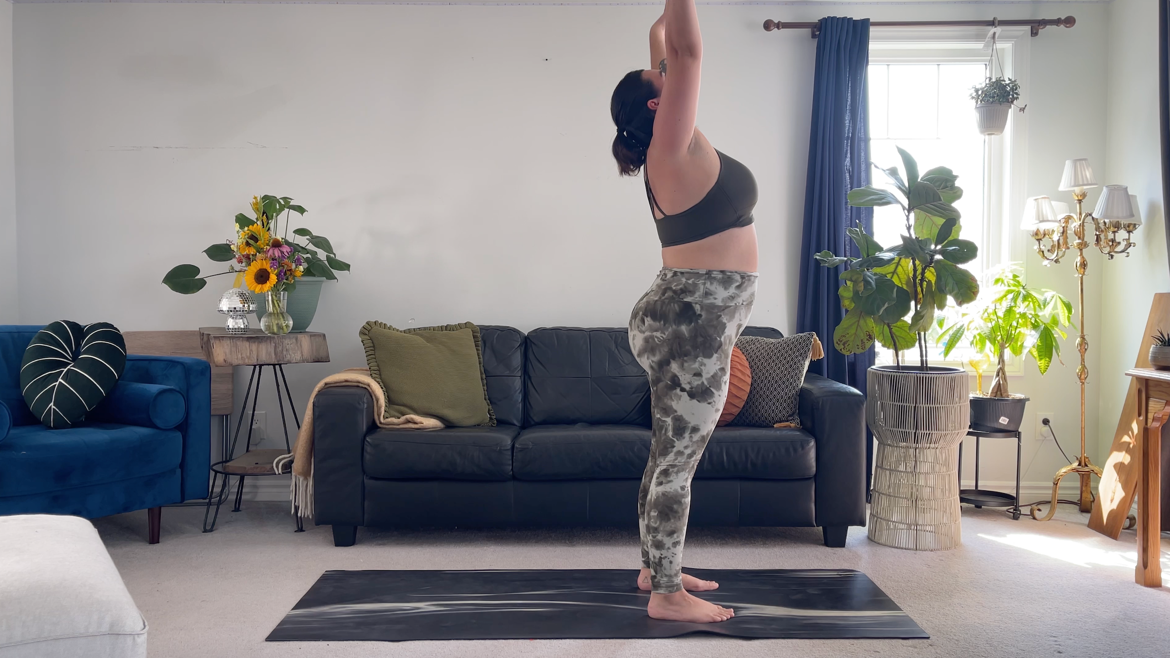 Yoga teacher Taylor Lorenz in Upward Salute