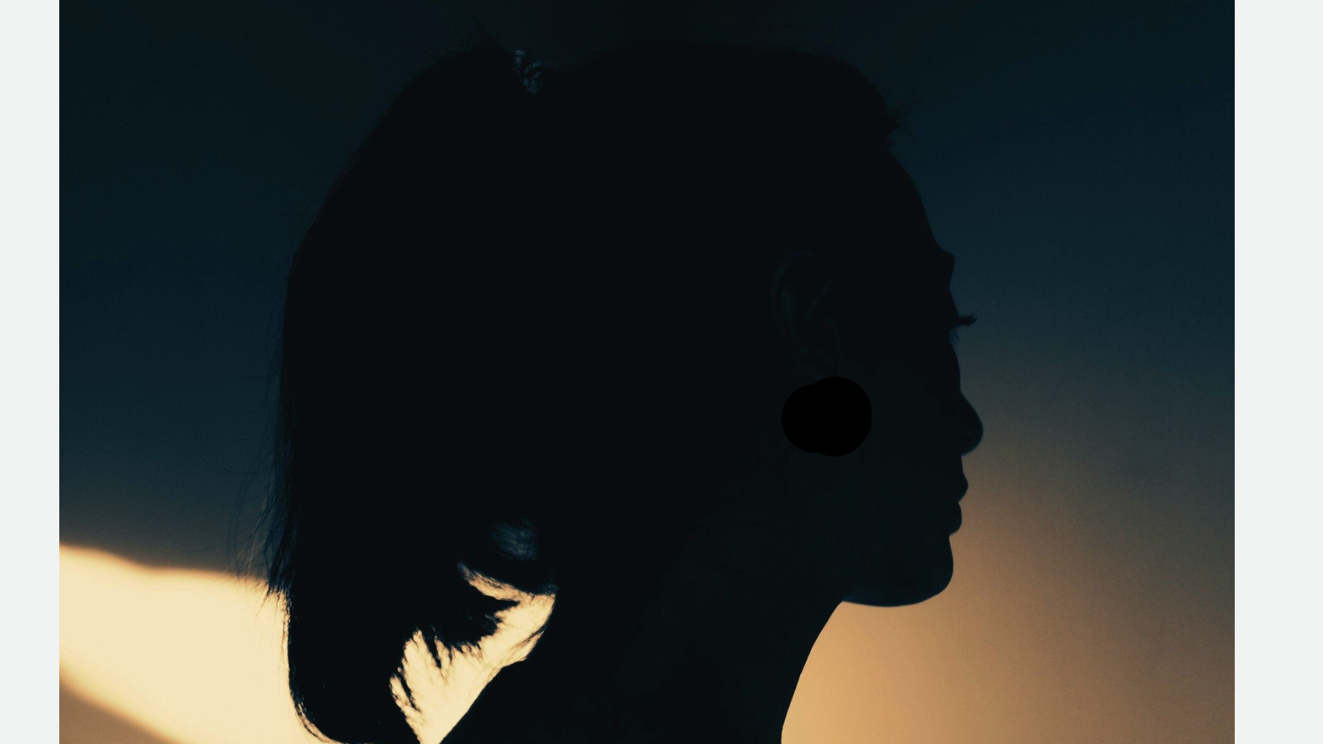 Woman silhouette from the light of the solar eclipse and new Moon in Virgo September 2025