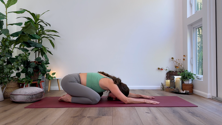 Teacher Devi Daly in Child's Pose