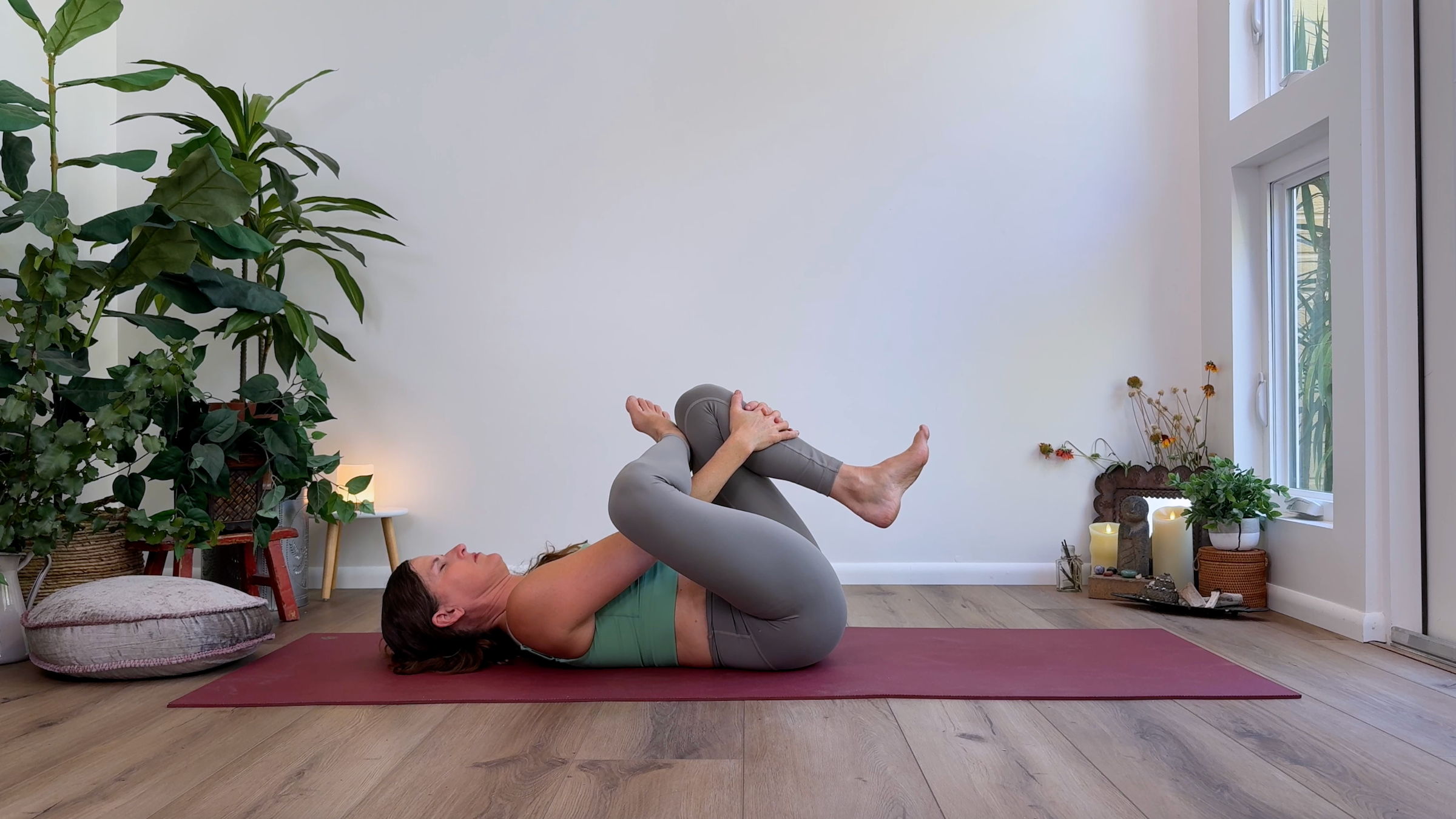 Yoga teacher Devi Daly in Figure Four, part of her Yin yoga practice
