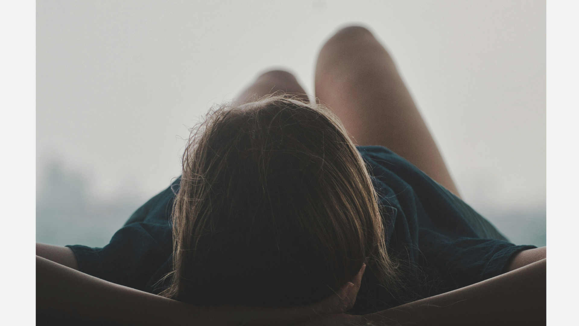 Woman lying down calm and relaxed