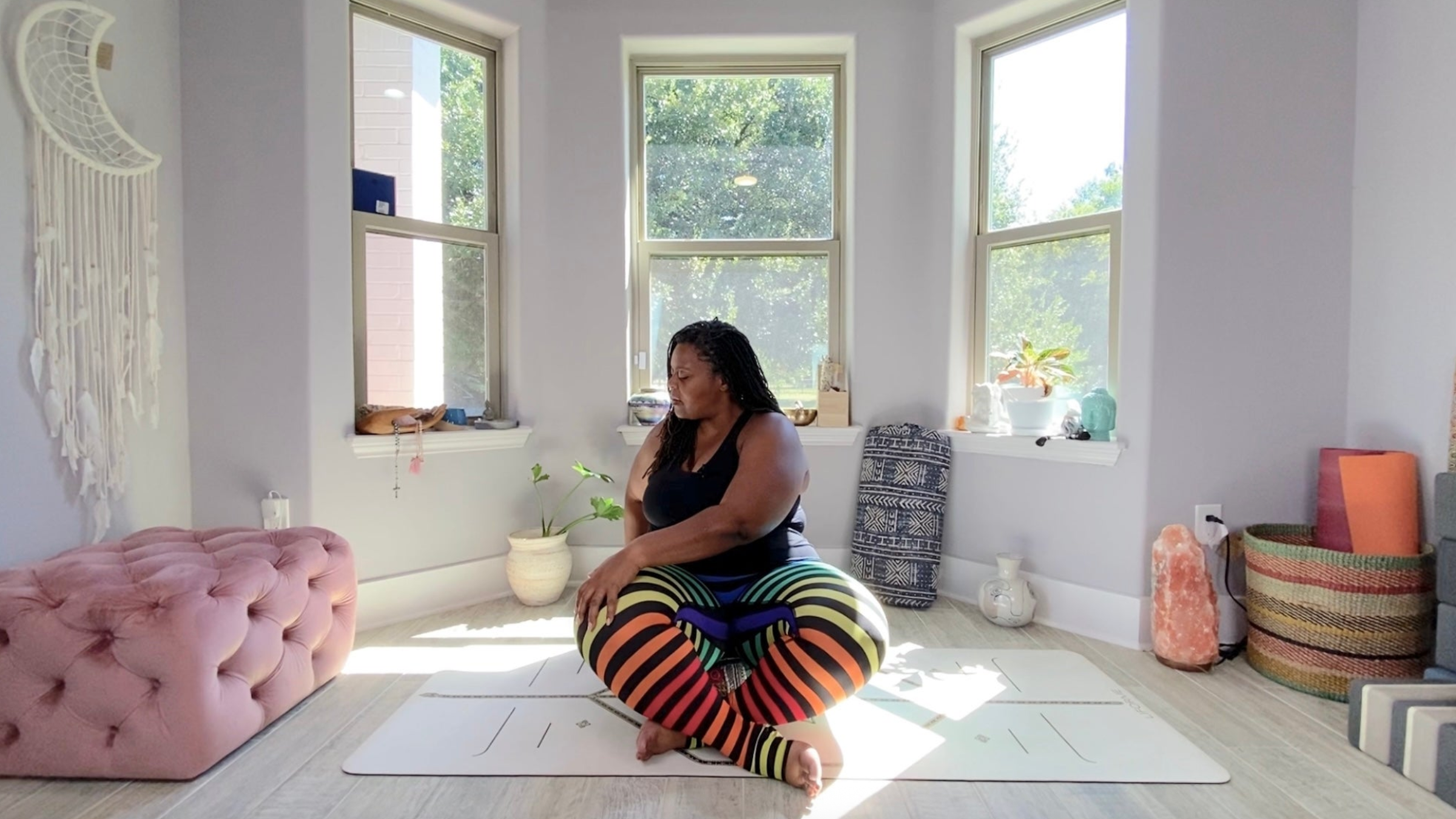 Yoga teacher Tamika Caston-Miller's yin yoga practice includes seated twist