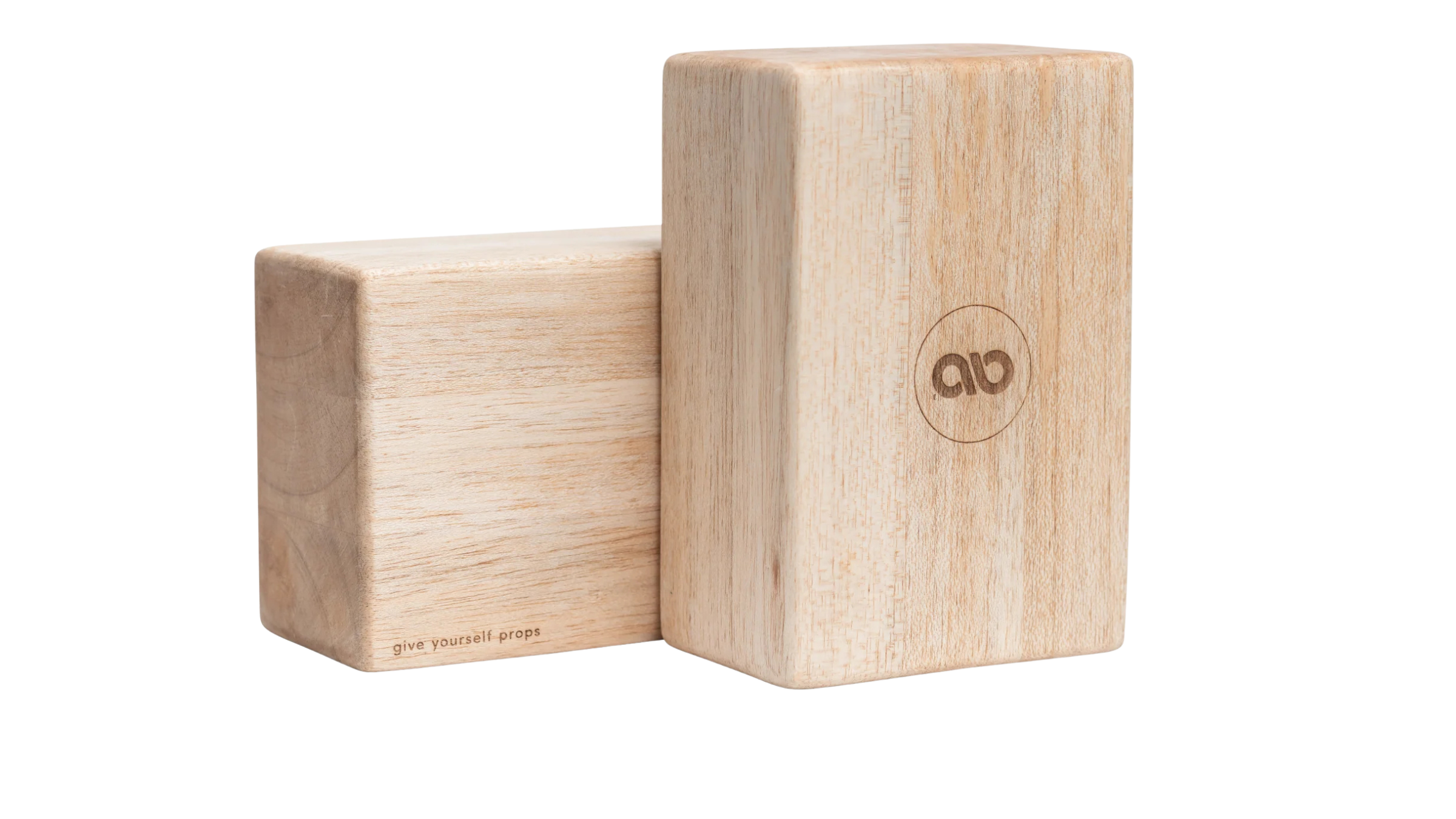 two yoga blocks next to each other made from balsa wood