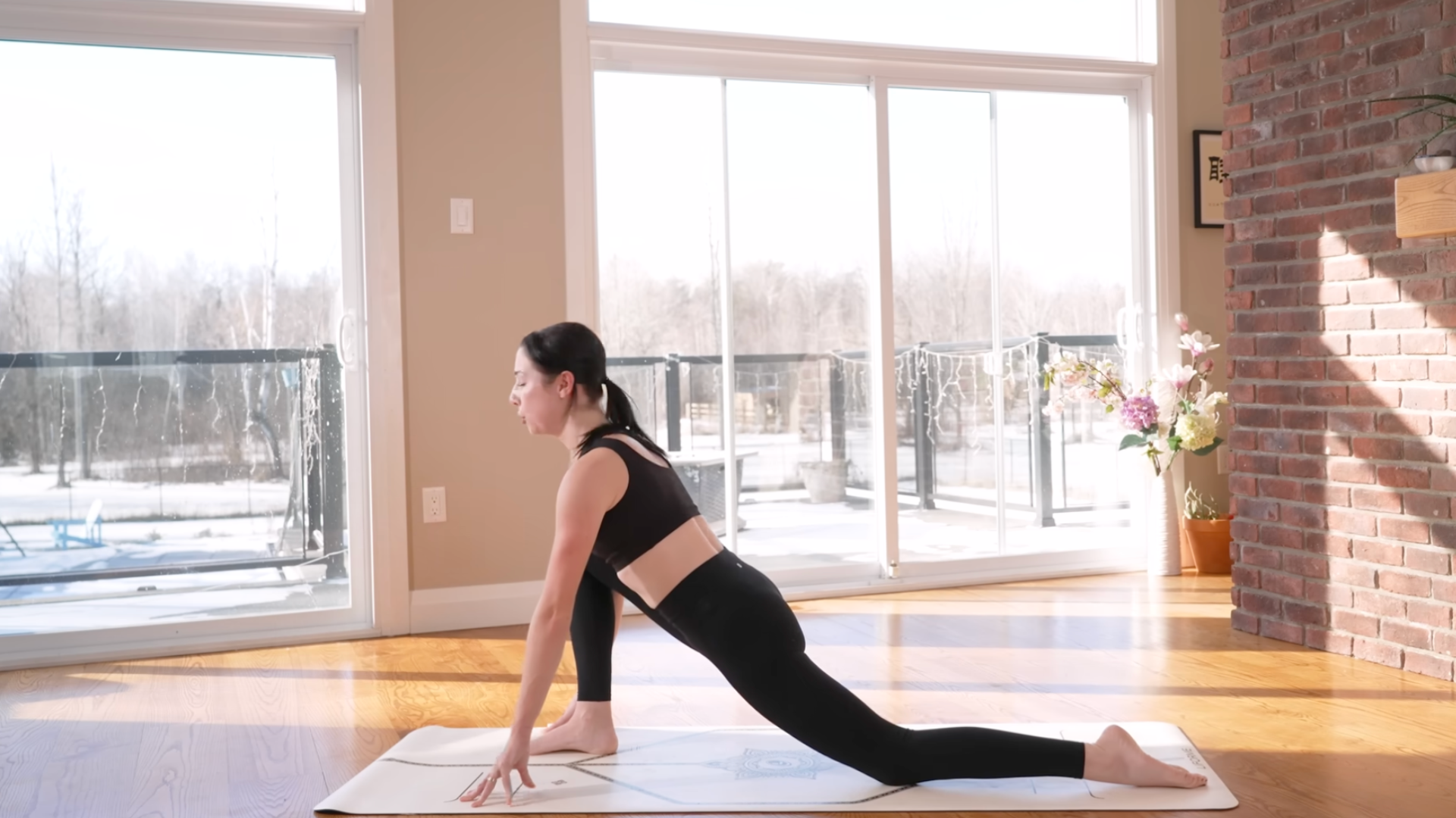 Woman in a Low Lunge on a mat