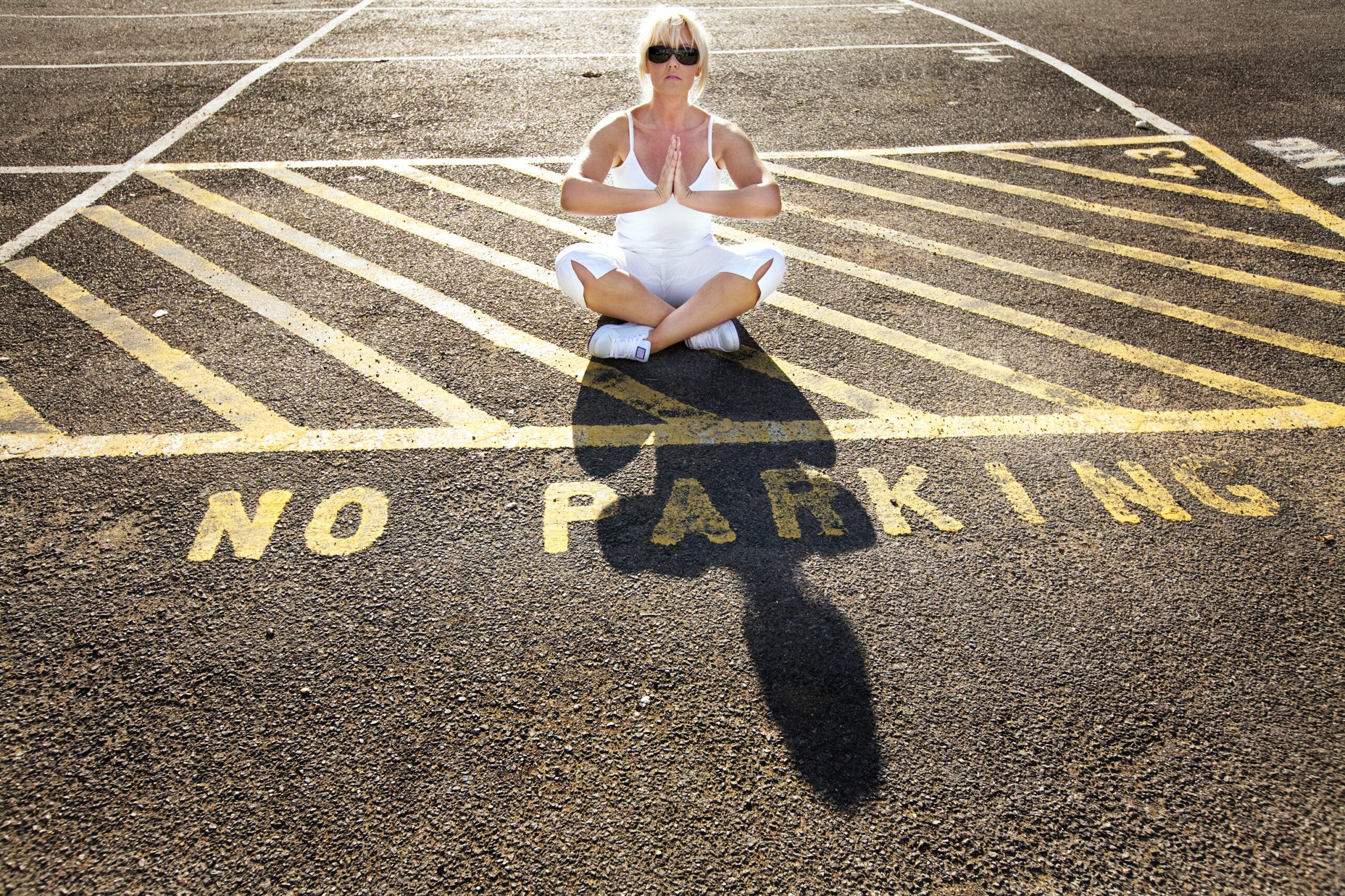 woman sitting in the street