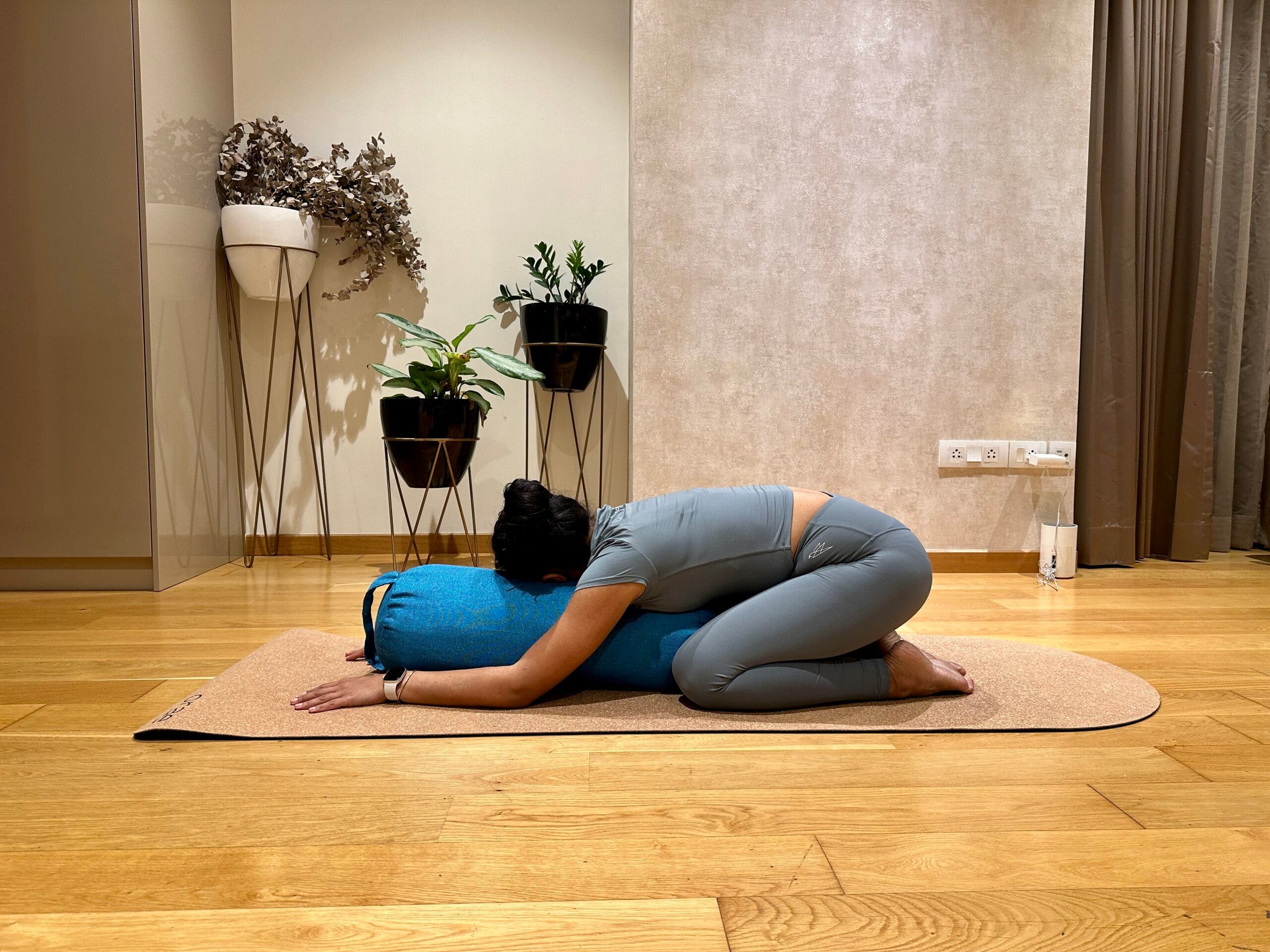 Supported Child's Pose with bolster