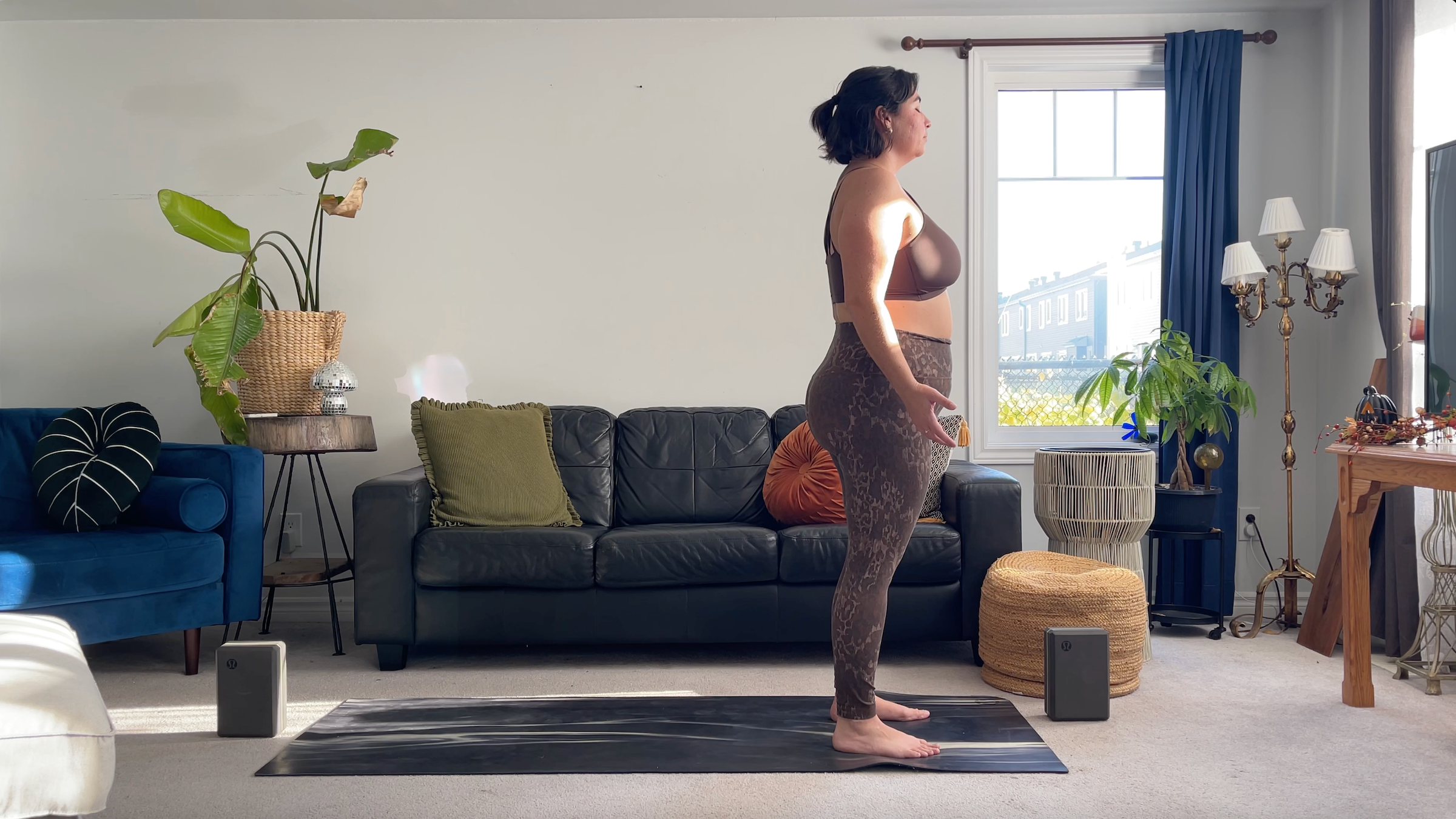 Teacher Taylor Lorenz in in Mountain Pose