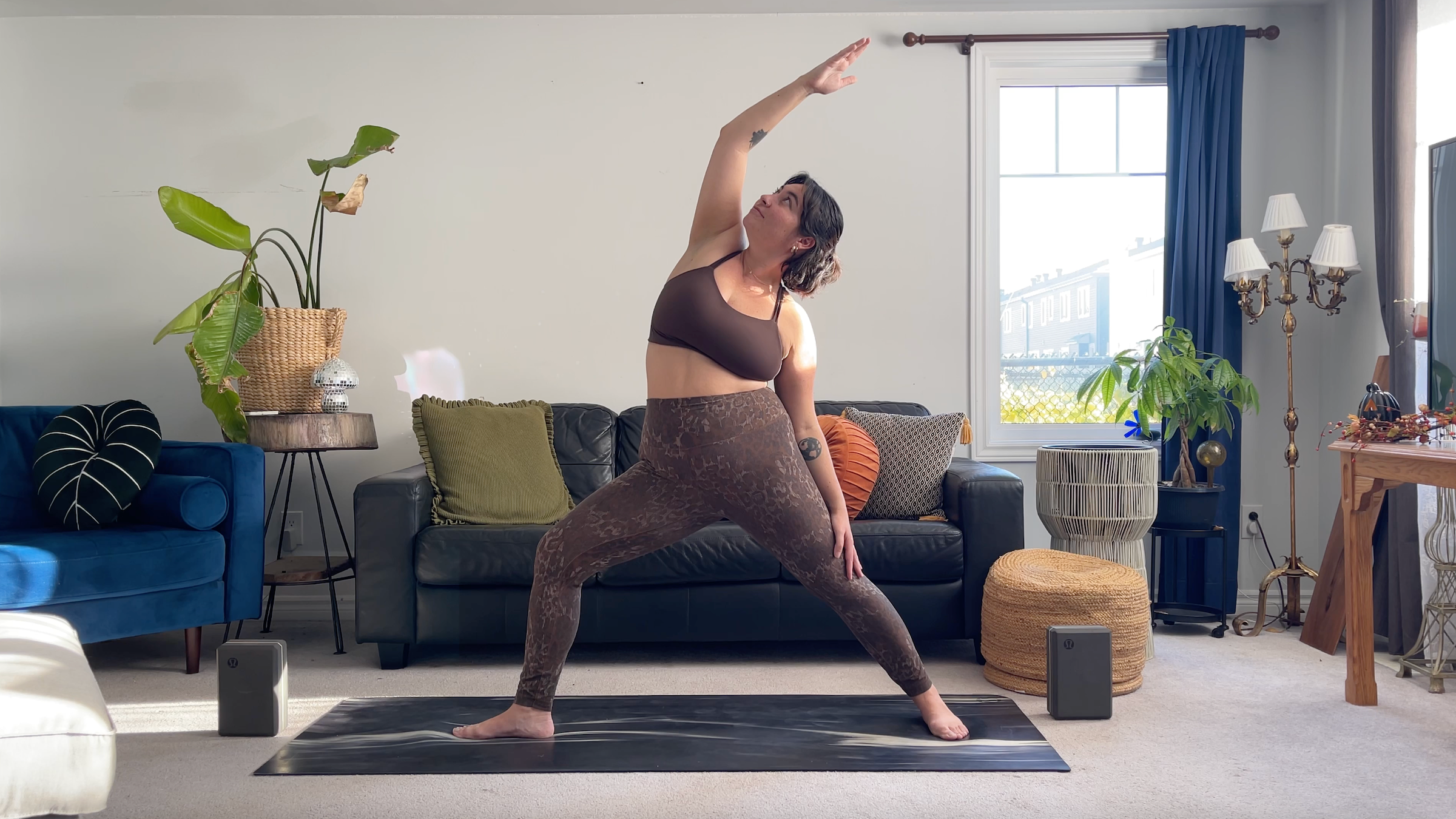 Yoga teacher Taylor Lorenz in Reverse Warrior, part of her full moon yoga routine