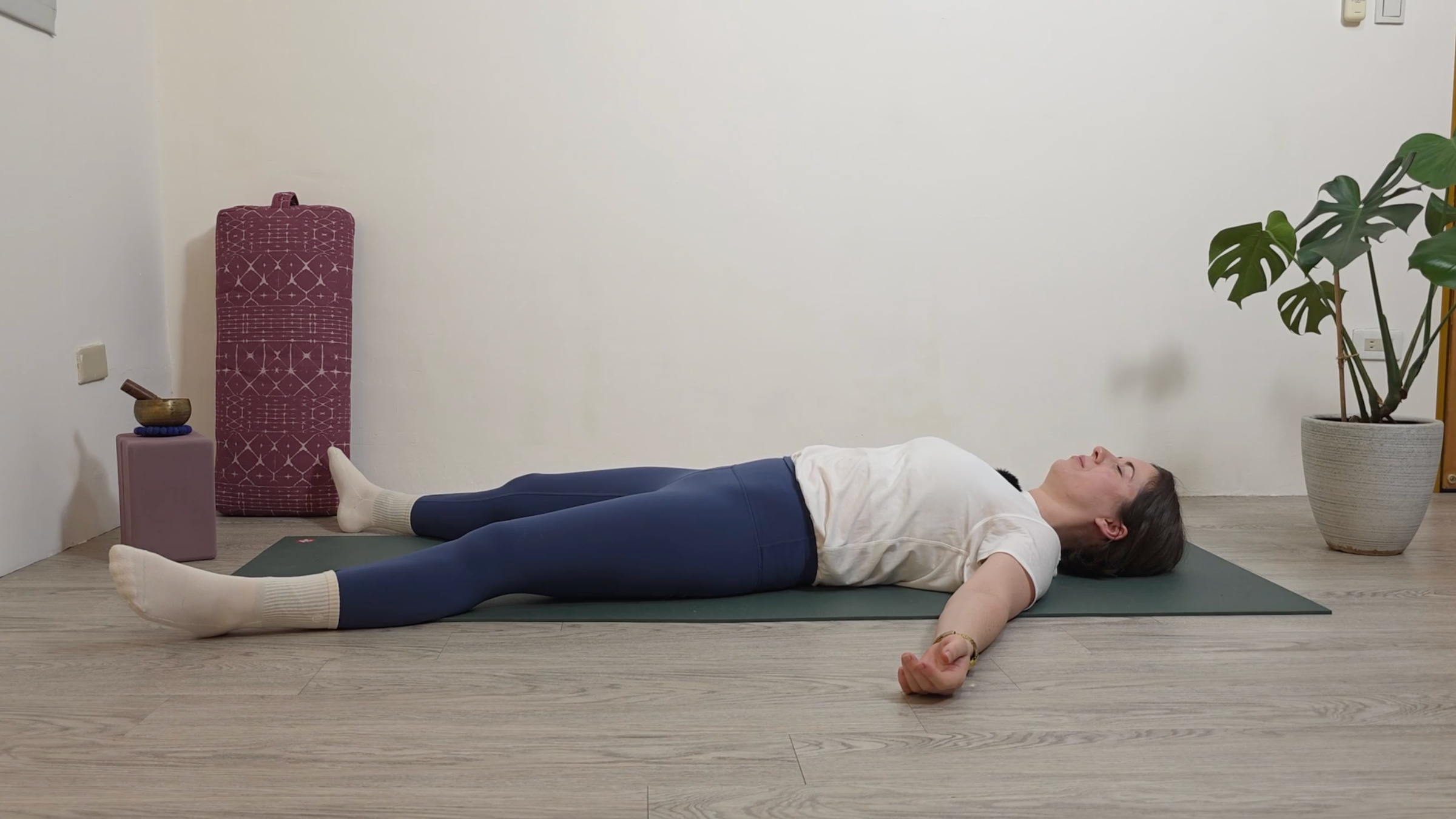 Yoga teacher Katie McGrath in Savasana