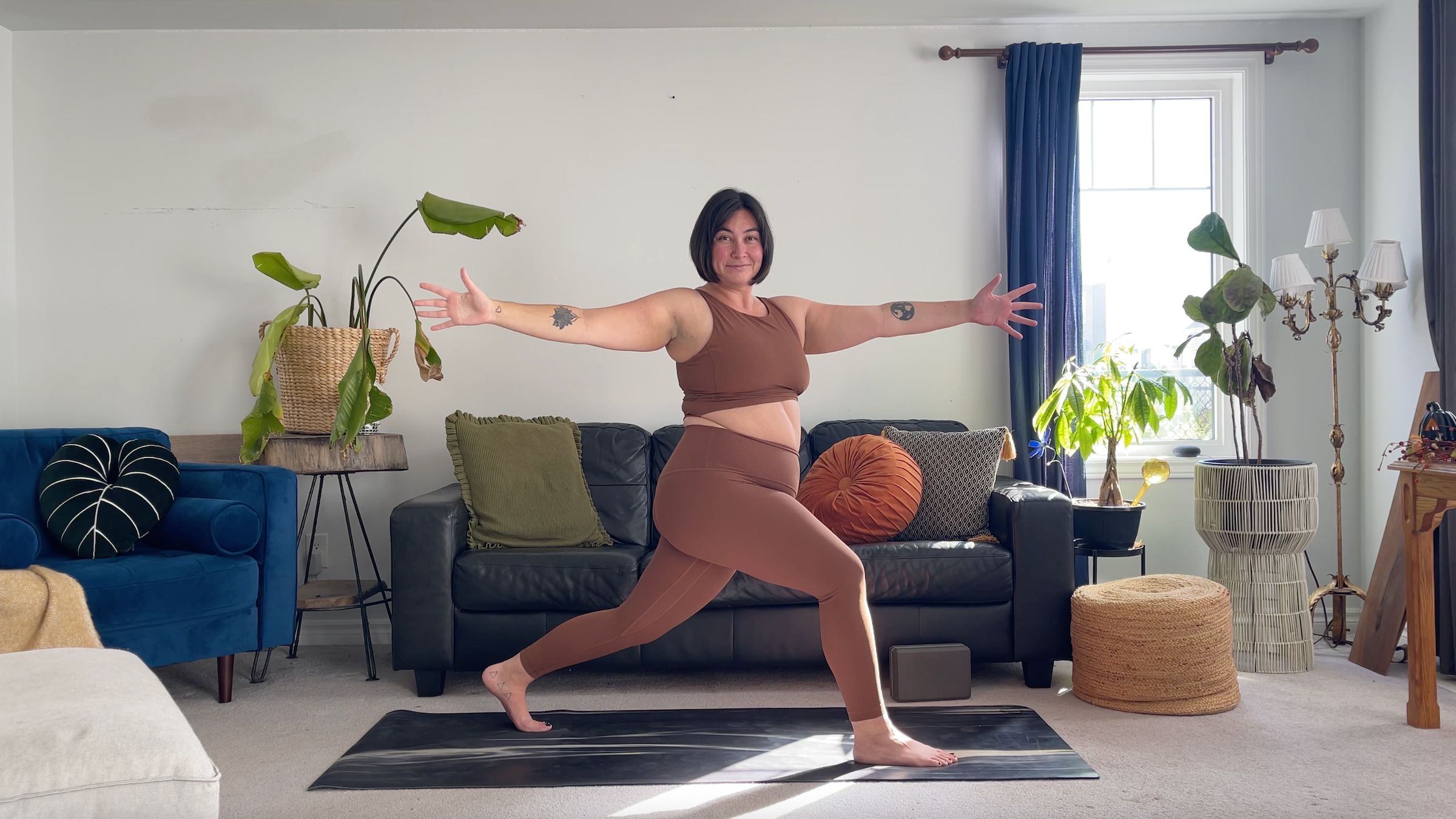 Teacher Taylor Lorenz in High Crescent Lunge Twist