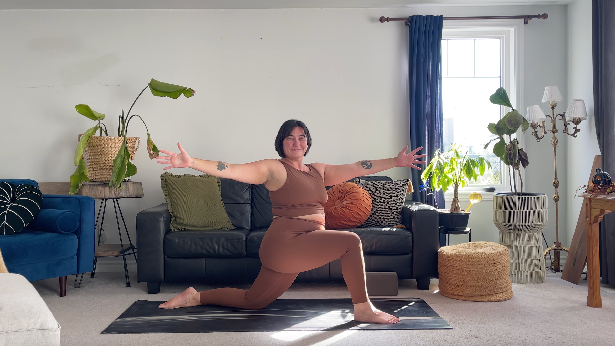 Teacher Taylor Lorenz in Low Lunge Twist