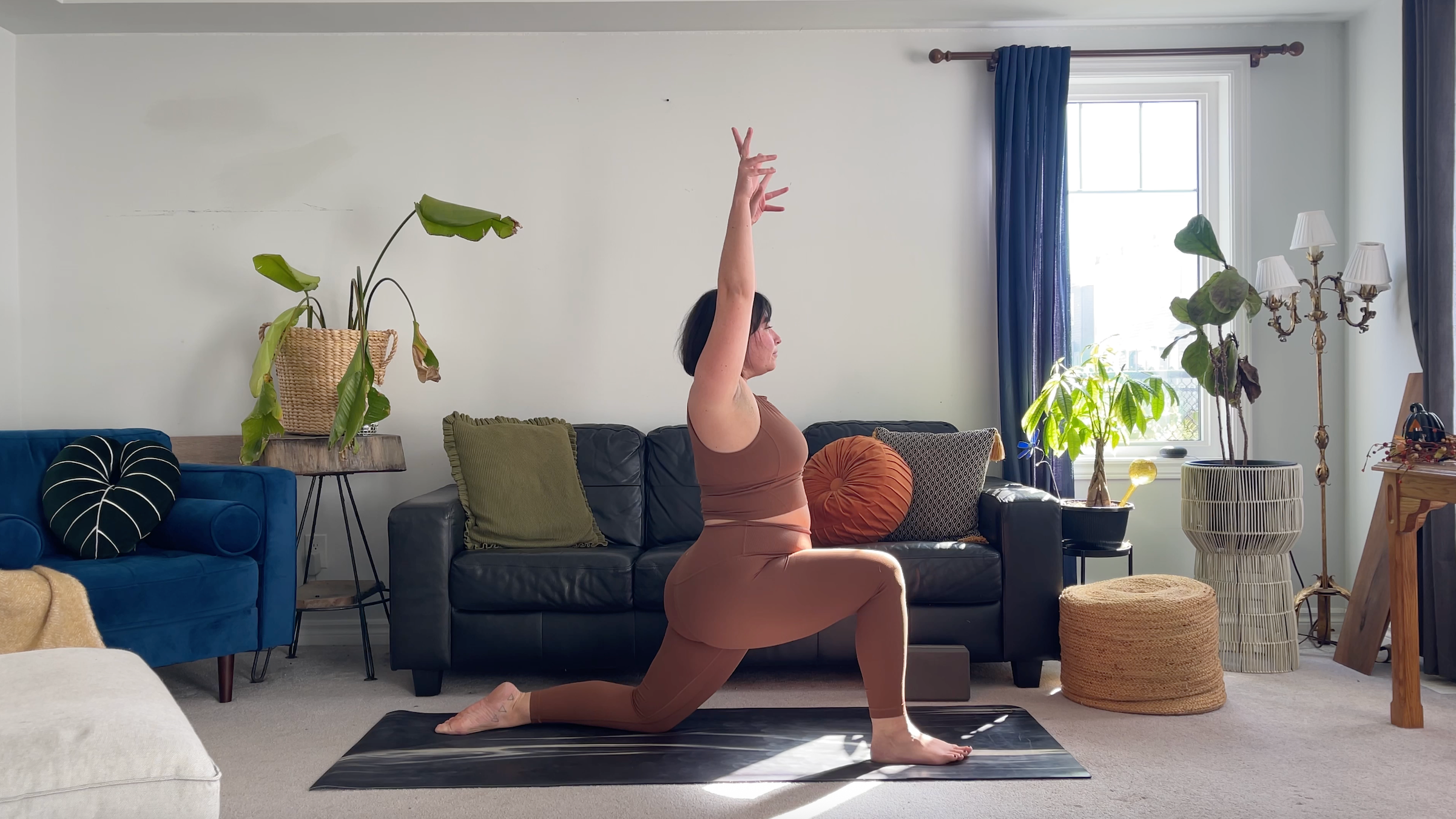 Yoga teacher Taylor Lorenz in Low Lunge, part of her morning yoga routine