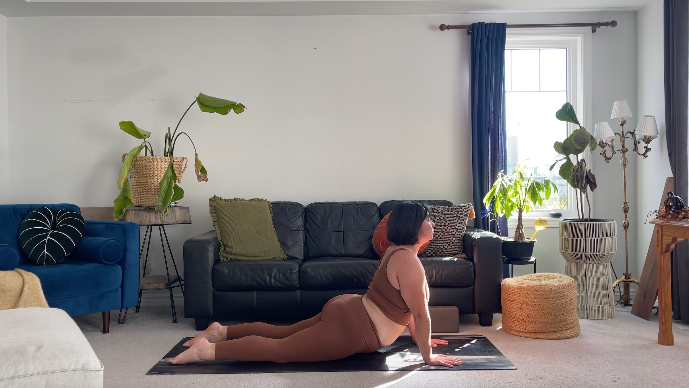 Teacher Taylor Lorenz in Cobra Pose