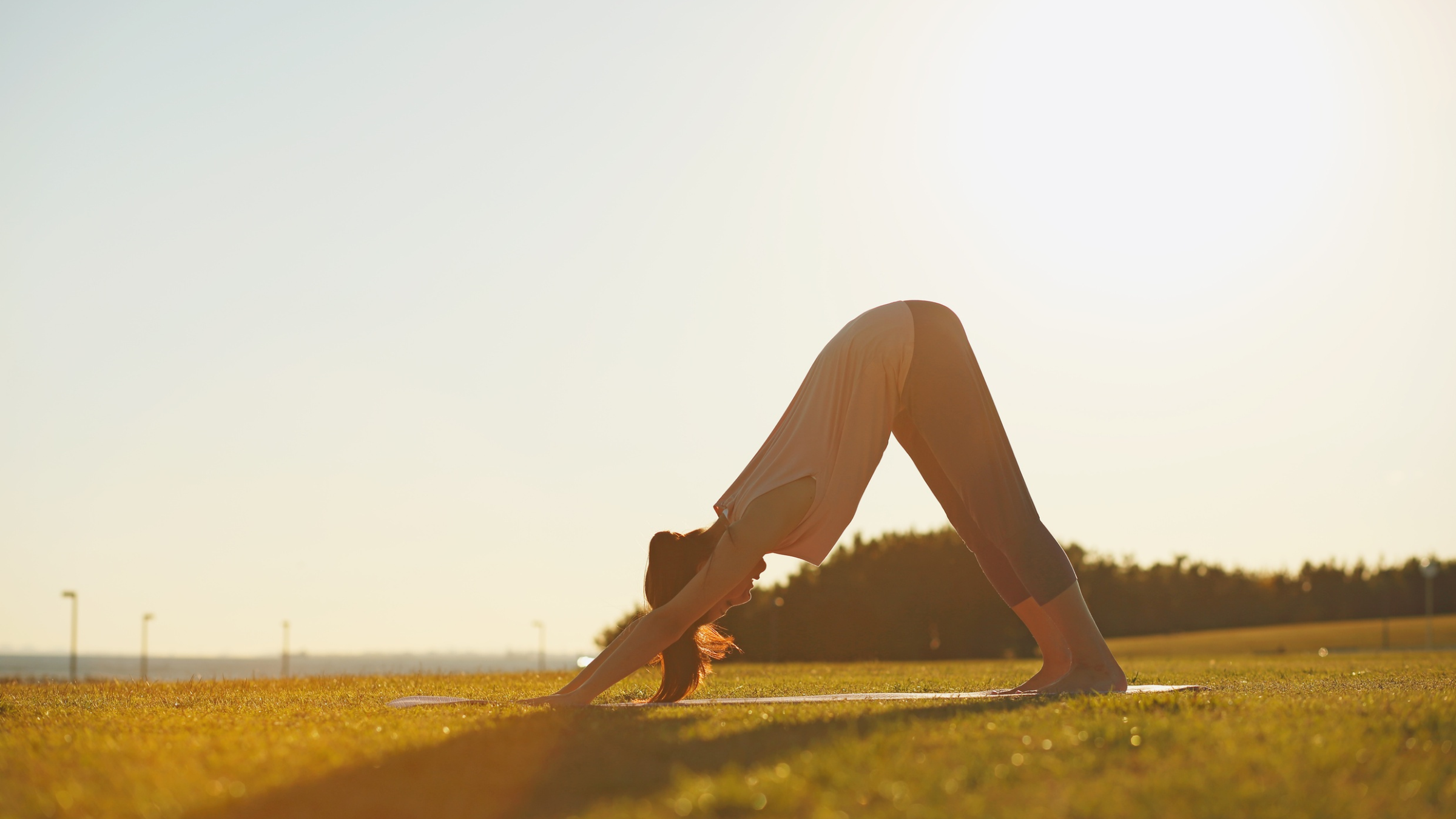 A woman practicing morning yoga