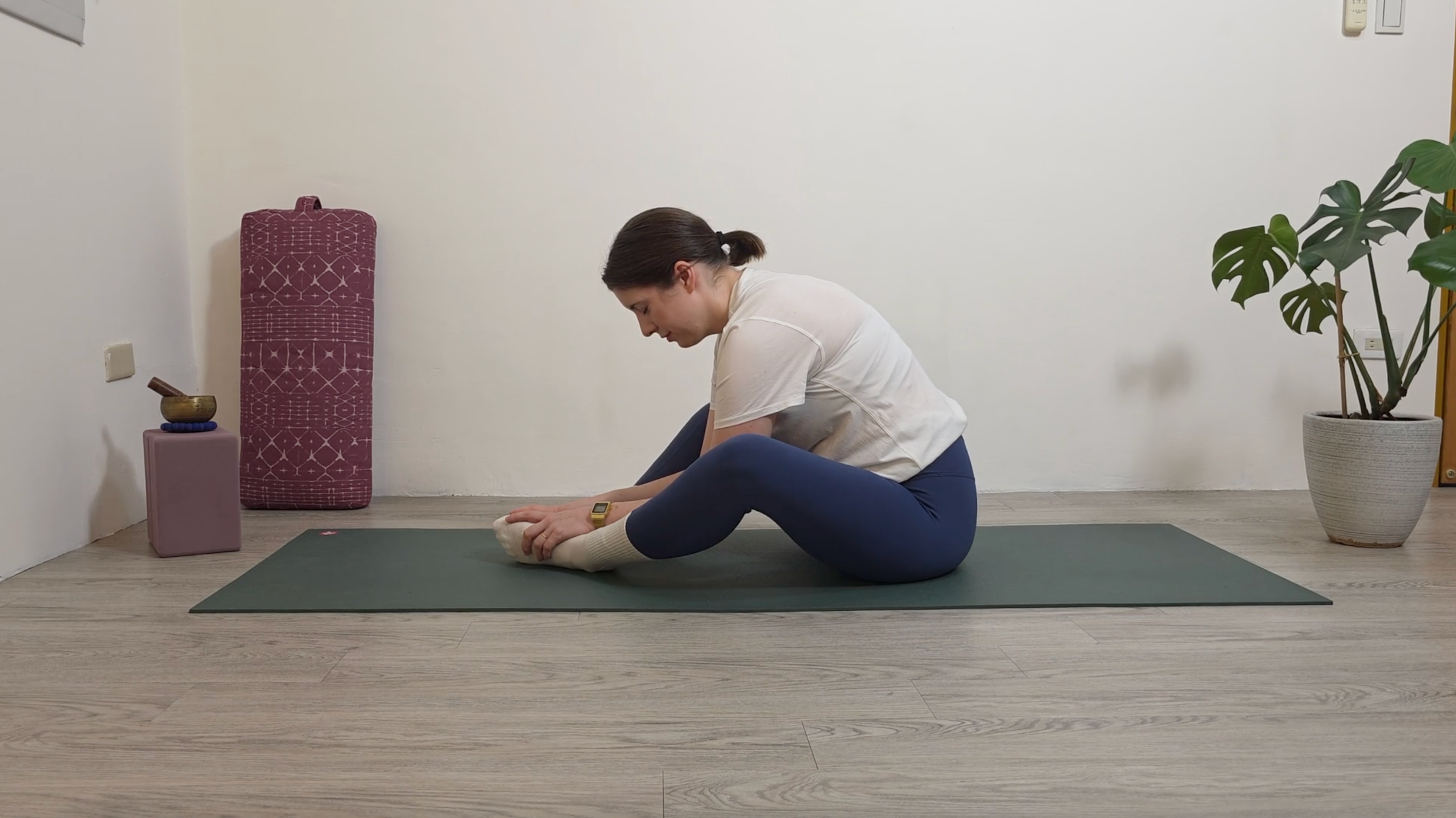 Yoga teacher Katie McGrath in Butterfly Pose, part of her yin yoga practice for beginners