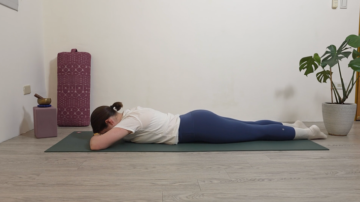 Yoga teacher Katie McGrath in Crocodile Pose