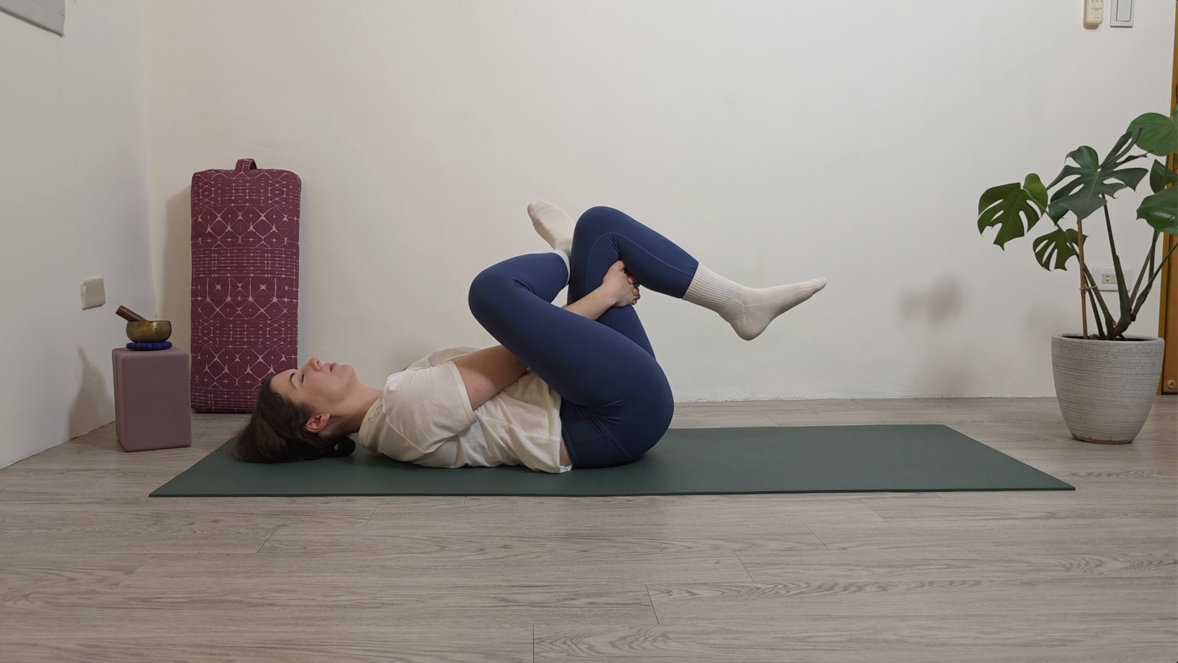 Yoga teacher Katie McGrath in Reclined Swan