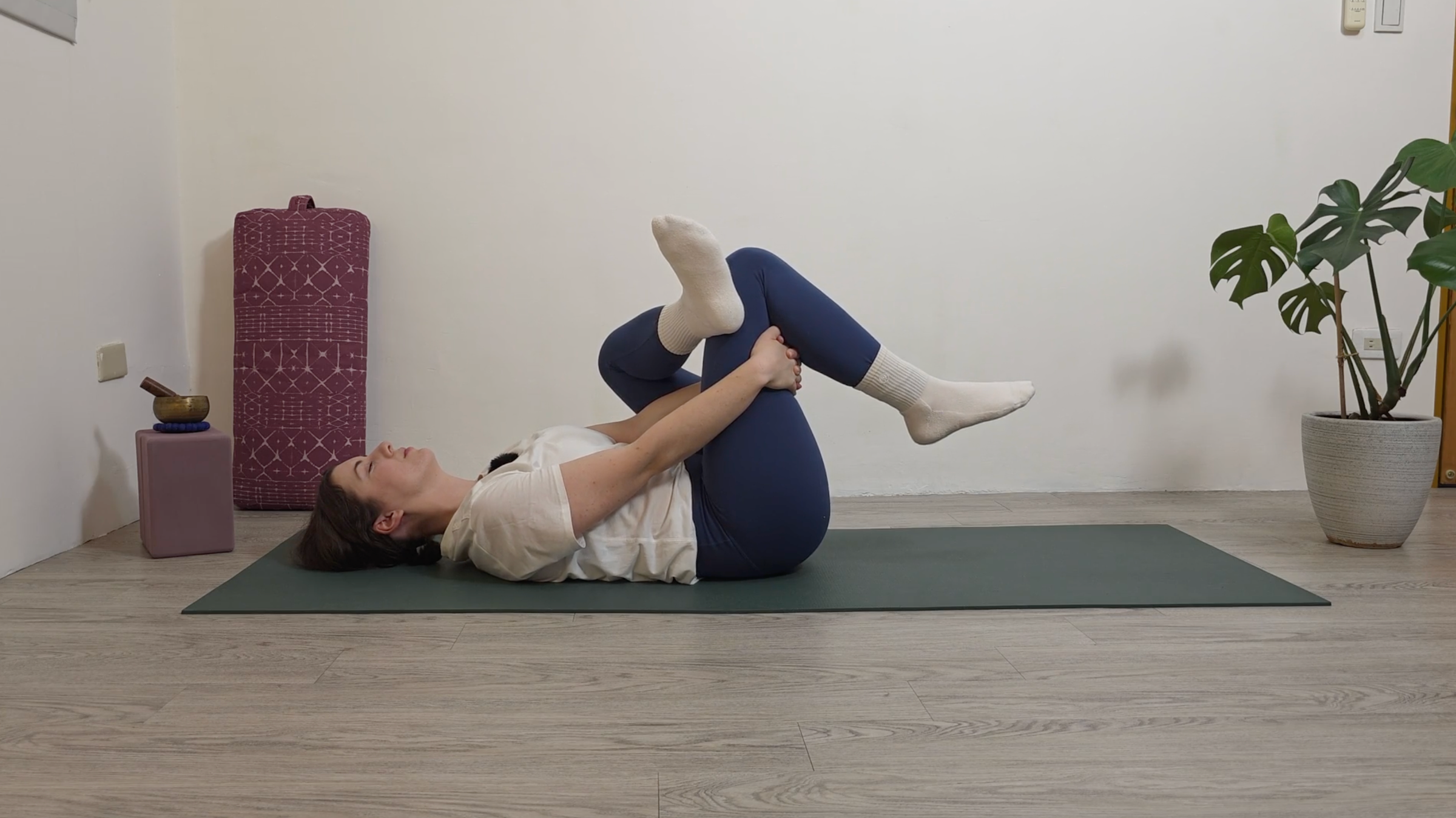 Yoga teacher Katie McGrath in Reclined Swan