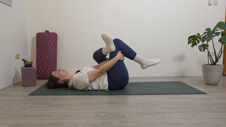 Yoga teacher Katie McGrath in Reclined Swan