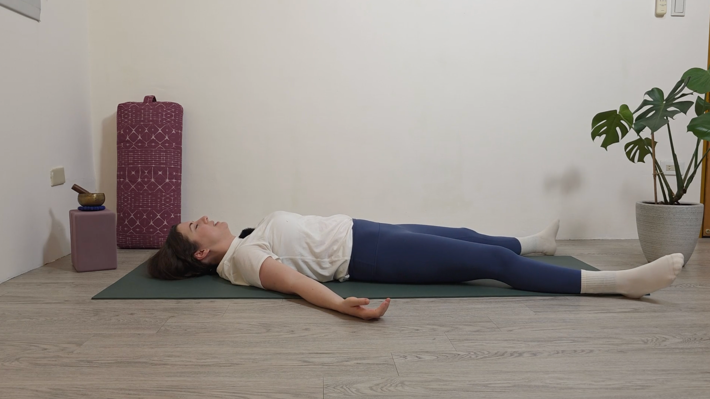 Yoga teacher Katie McGrath in Savasana