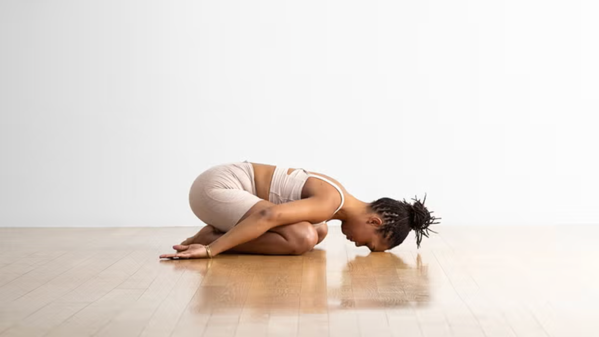 Child's Pose, one of the best yoga for sleep shapes