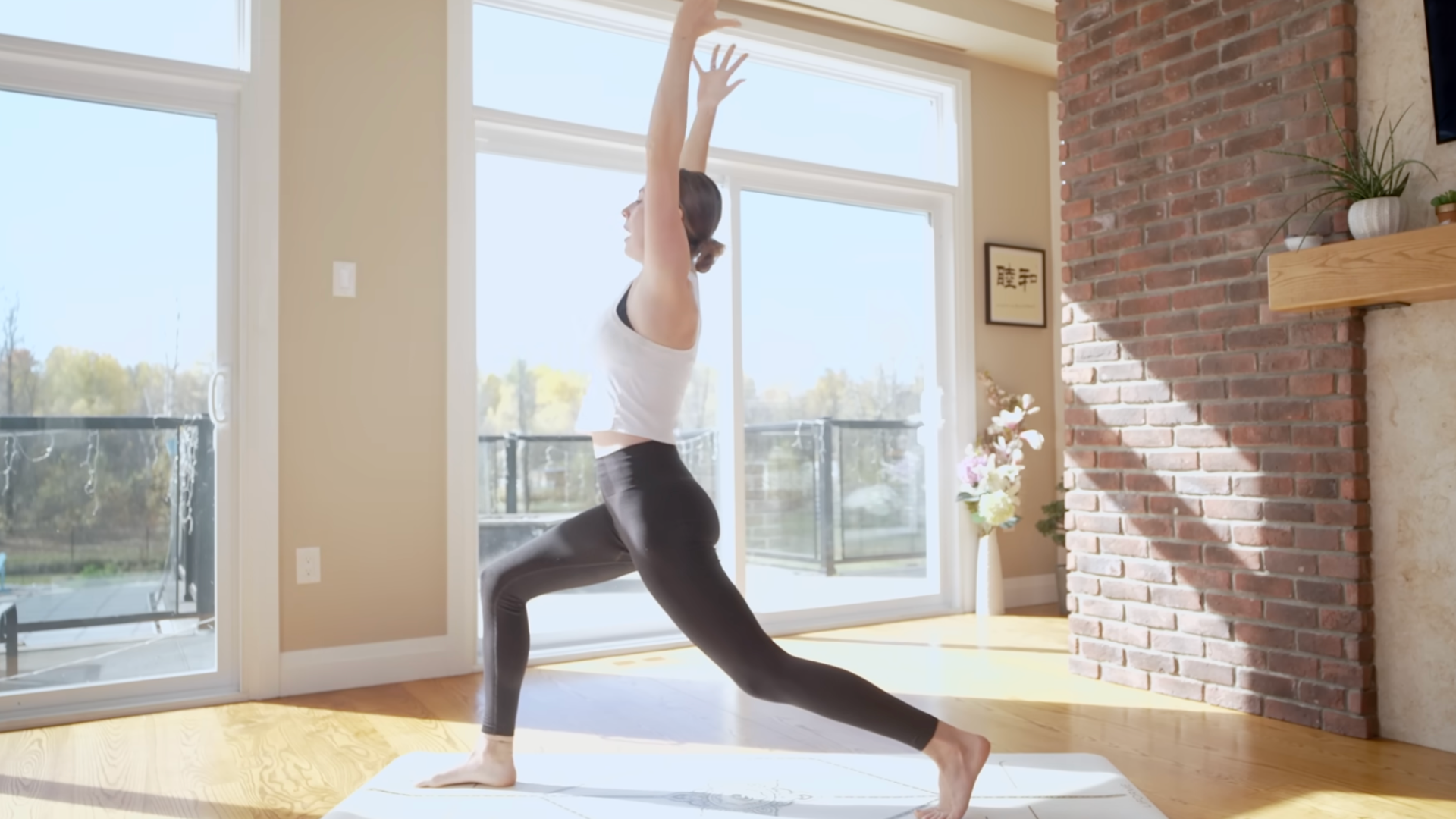Woman on a yoga mat in a High Lunge