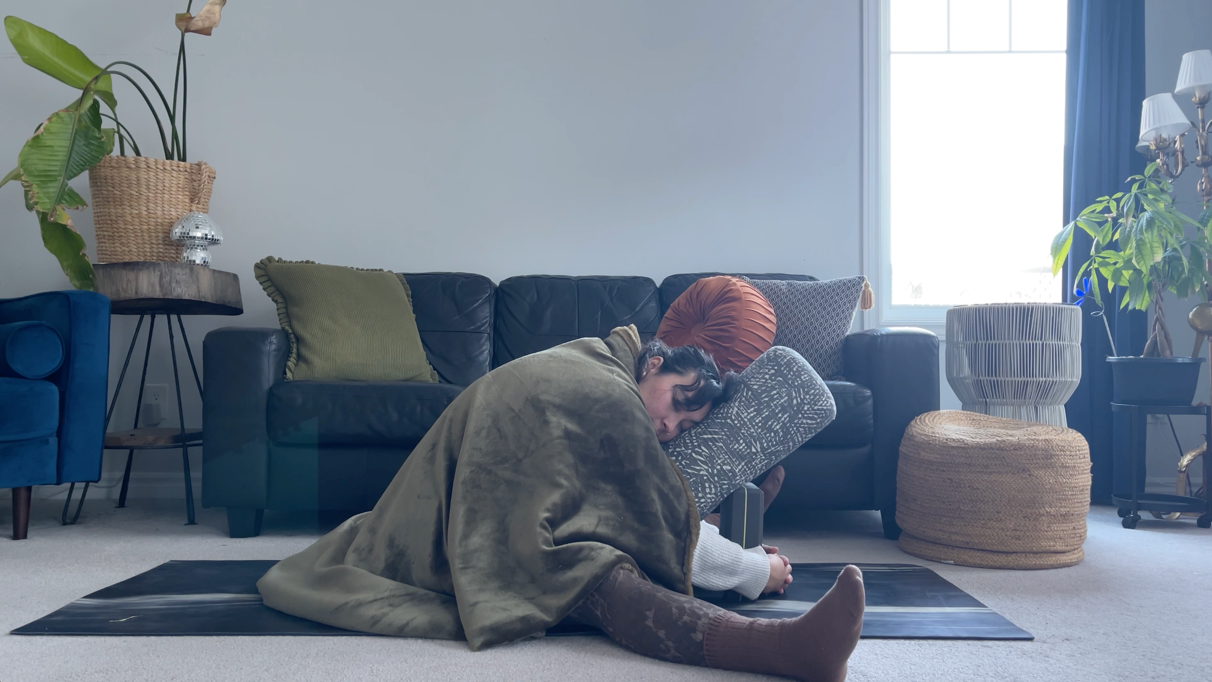 Yoga teacher Taylor Lorenz in Seated Wide Angle
