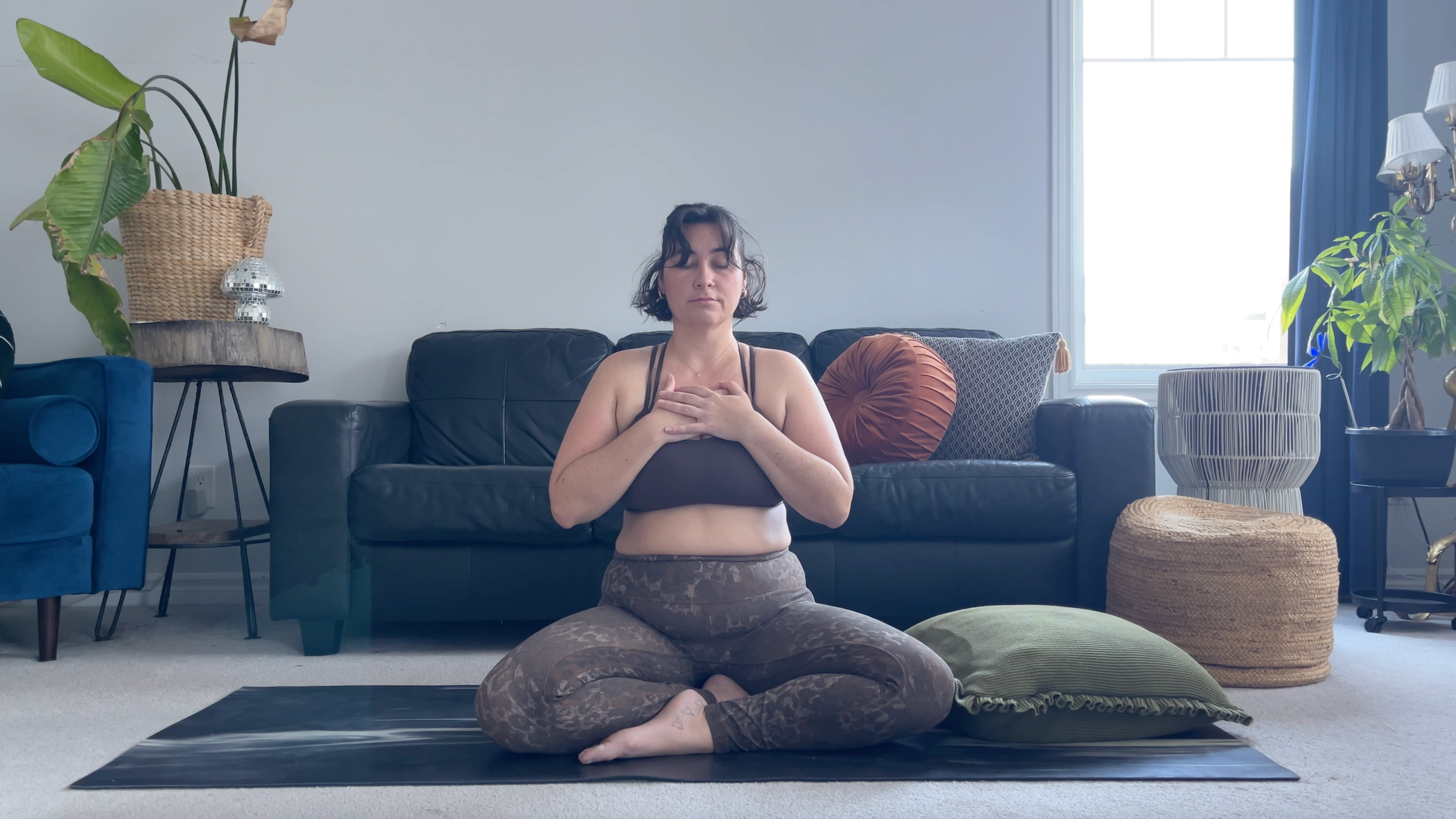 Teacher Taylor Lorenz in Meditation Pose