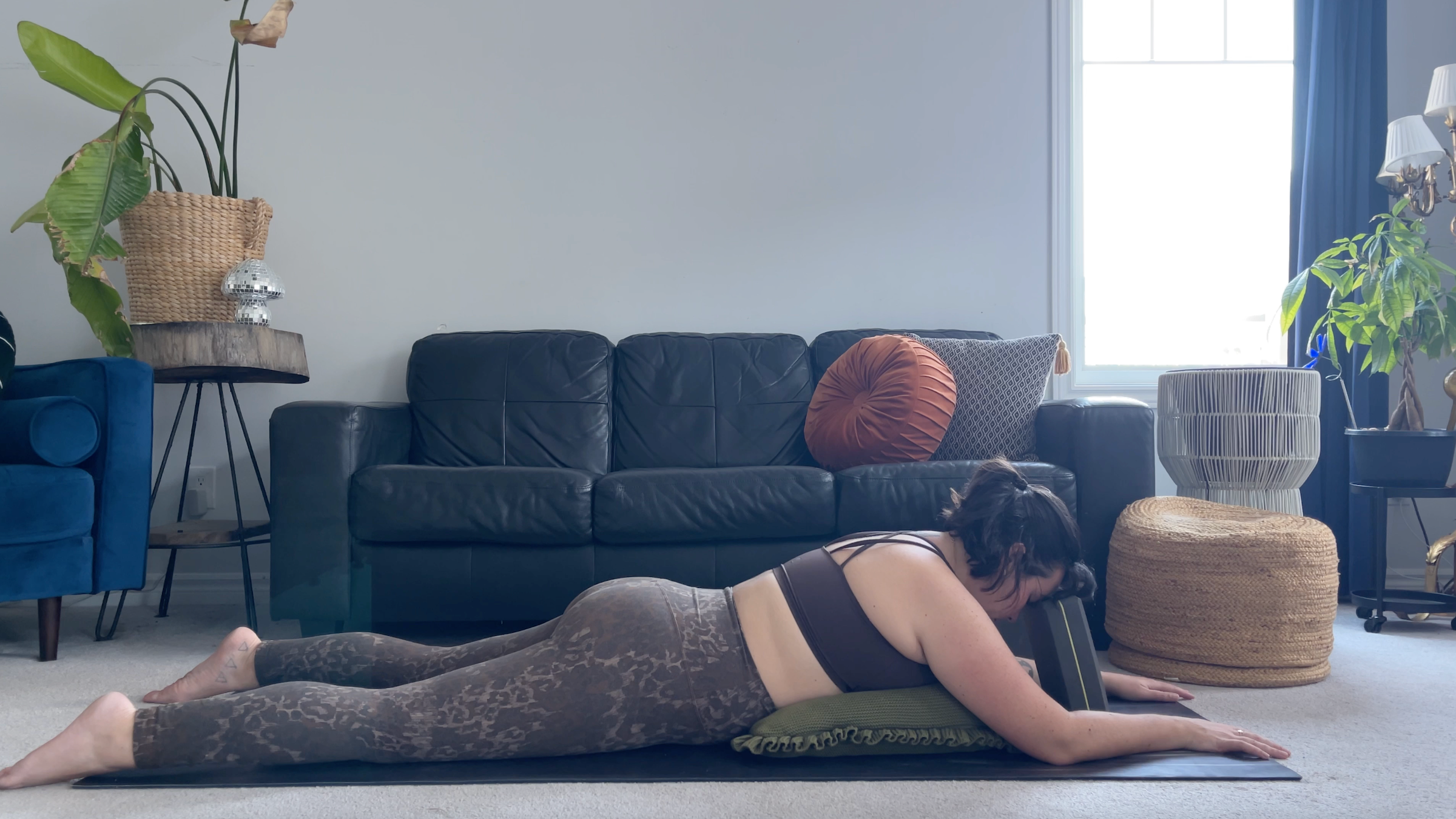 Teacher Taylor Lorenz in Sphinx Pose