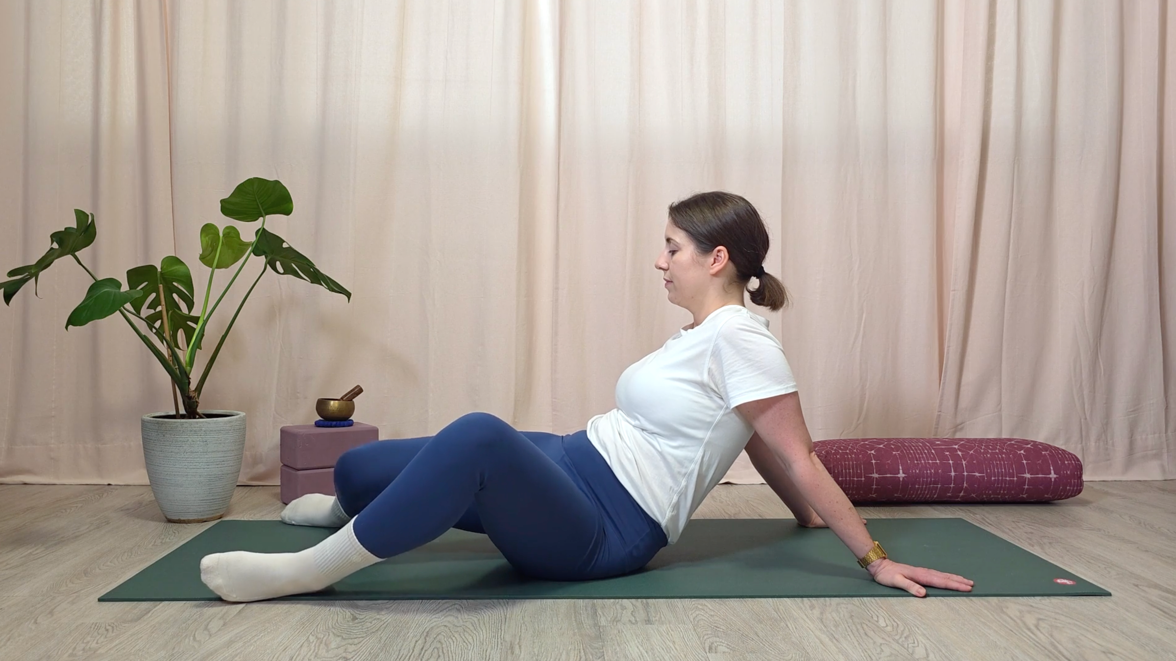 Yoga teacher Katie McGrath doing Windshield Wipers