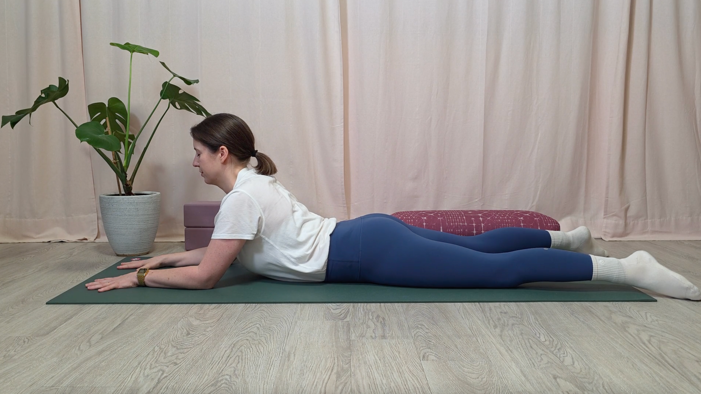 Yoga teacher Katie McGrath in Sphinx Pose, part of her yin yoga practice