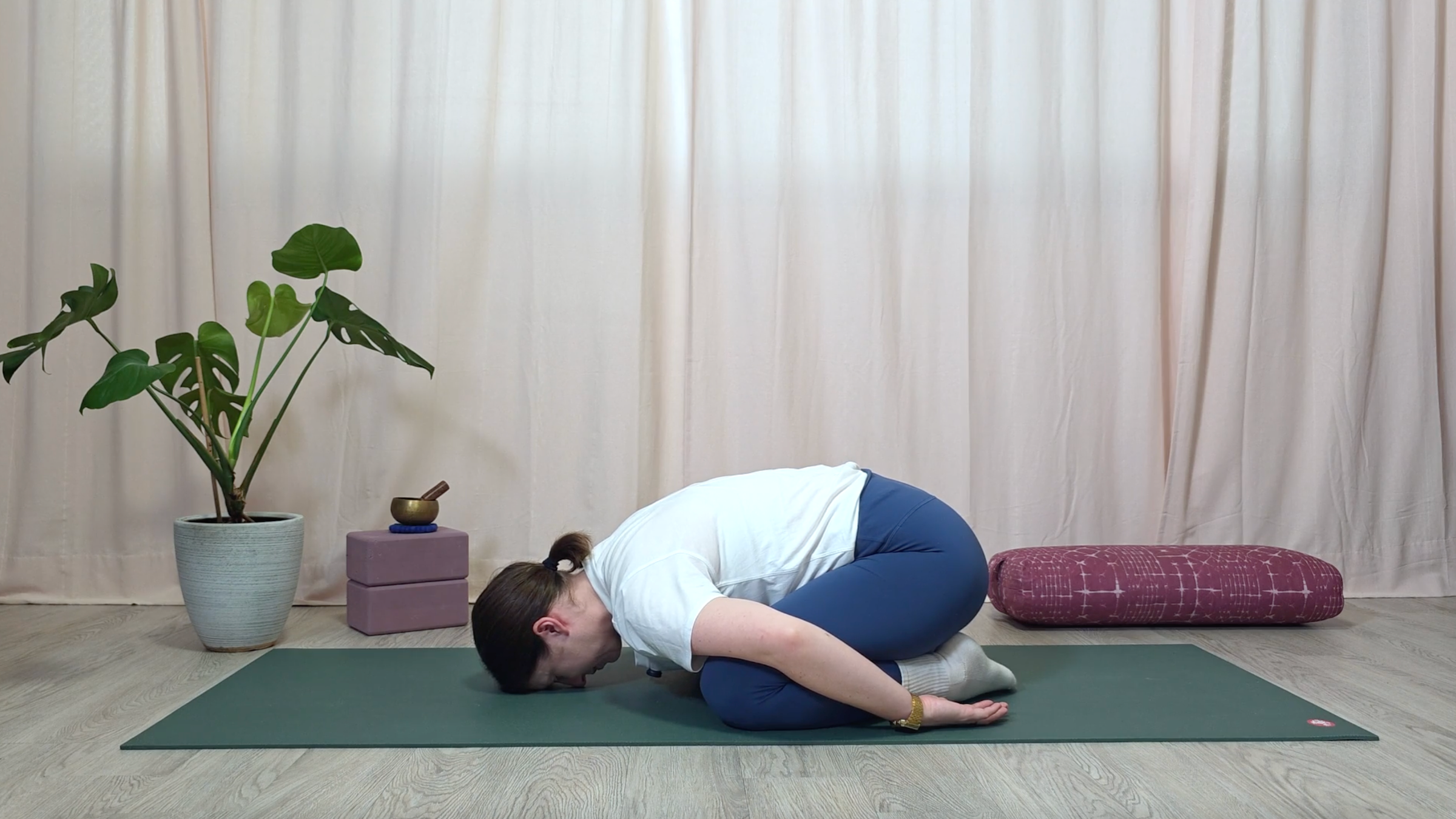 Yin yoga teacher Katie McGrath in Child's Pose