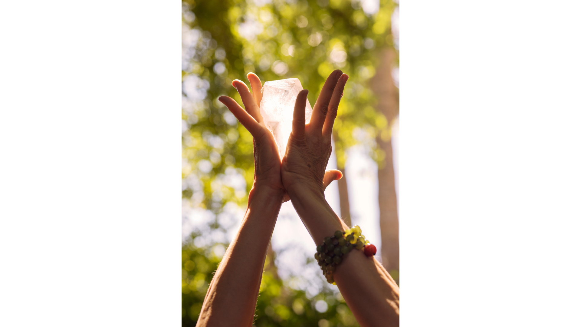 Woman holding crystal between hands