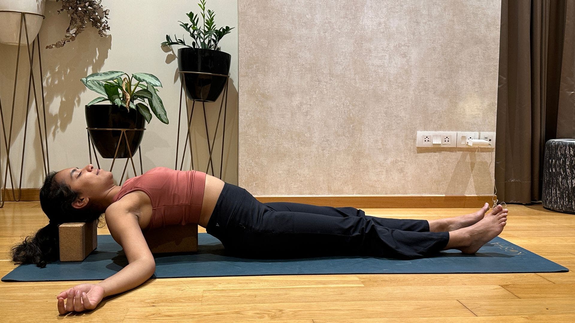 Riya Davda in Supported Fish Pose.