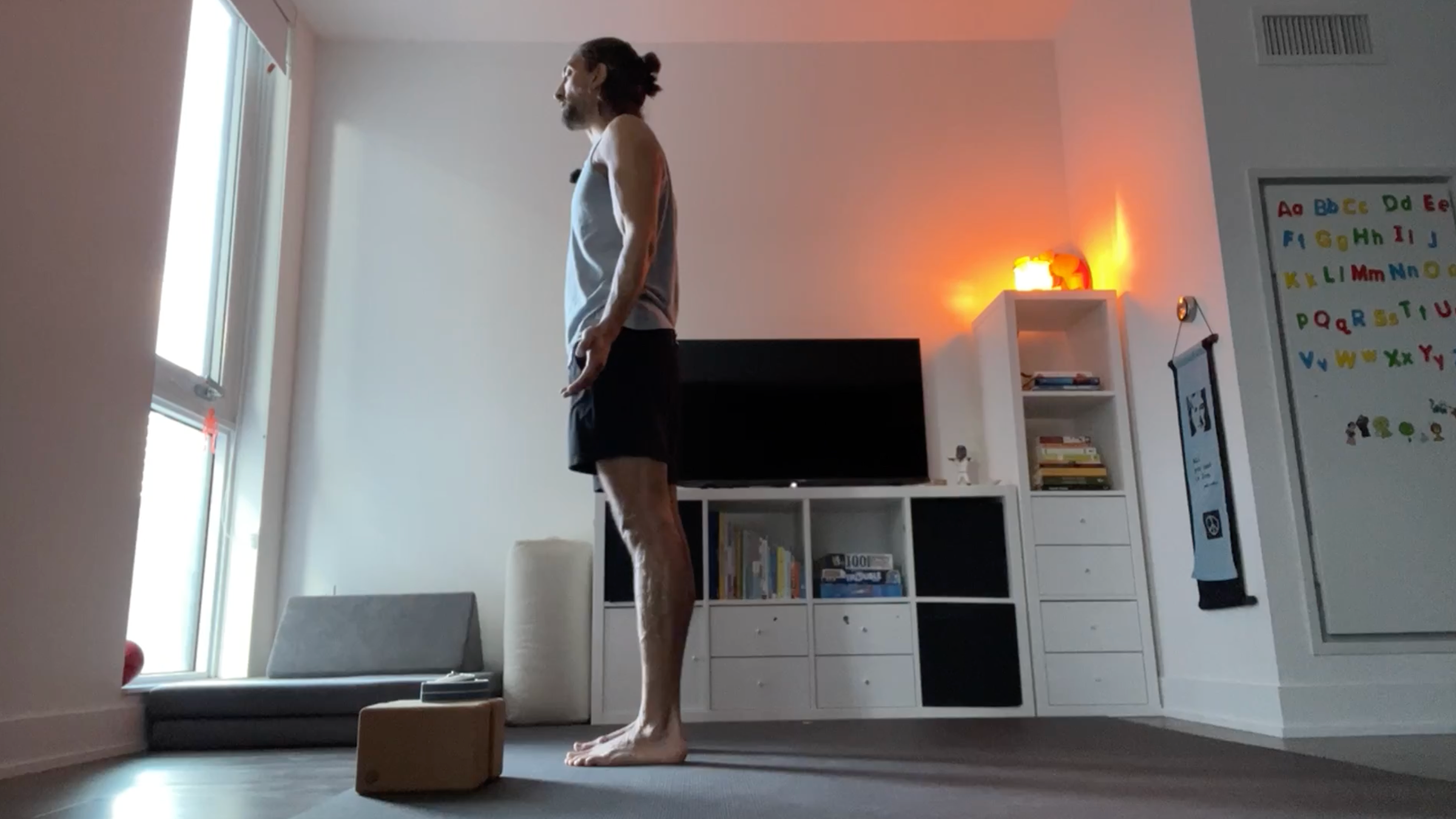 Yoga teacher Jaffer Hussain in Mountain Pose, part of his simple yoga flow