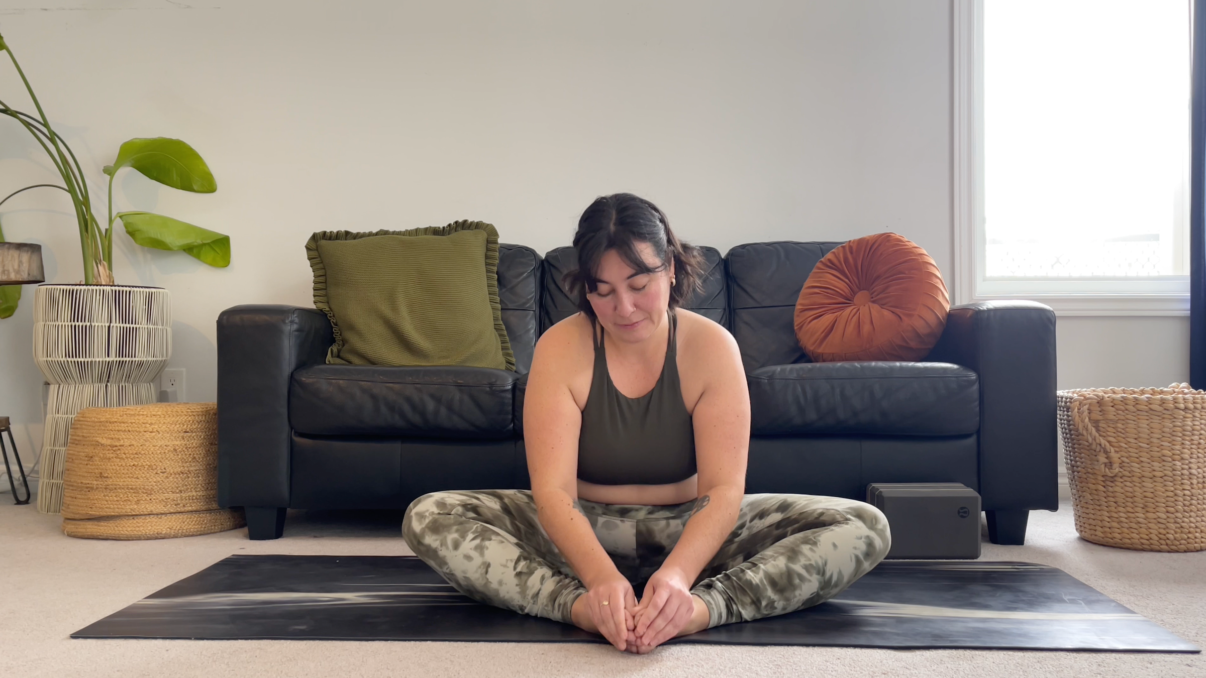 Teacher Taylor Lorenz in Bound Angle Pose