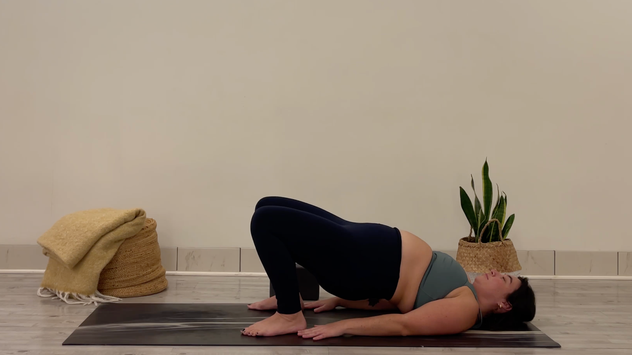 Teacher Taylor Lorenz in Bridge Pose