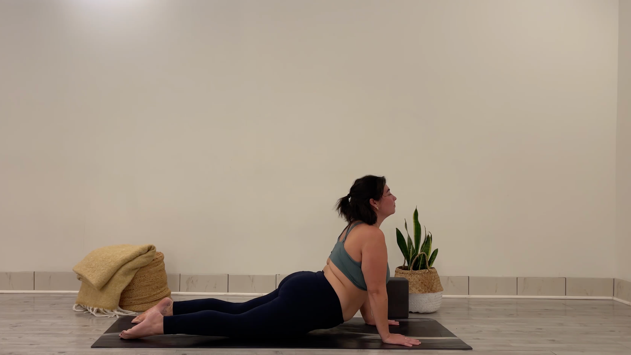 Teacher Taylor Lorenz in Cobra Pose