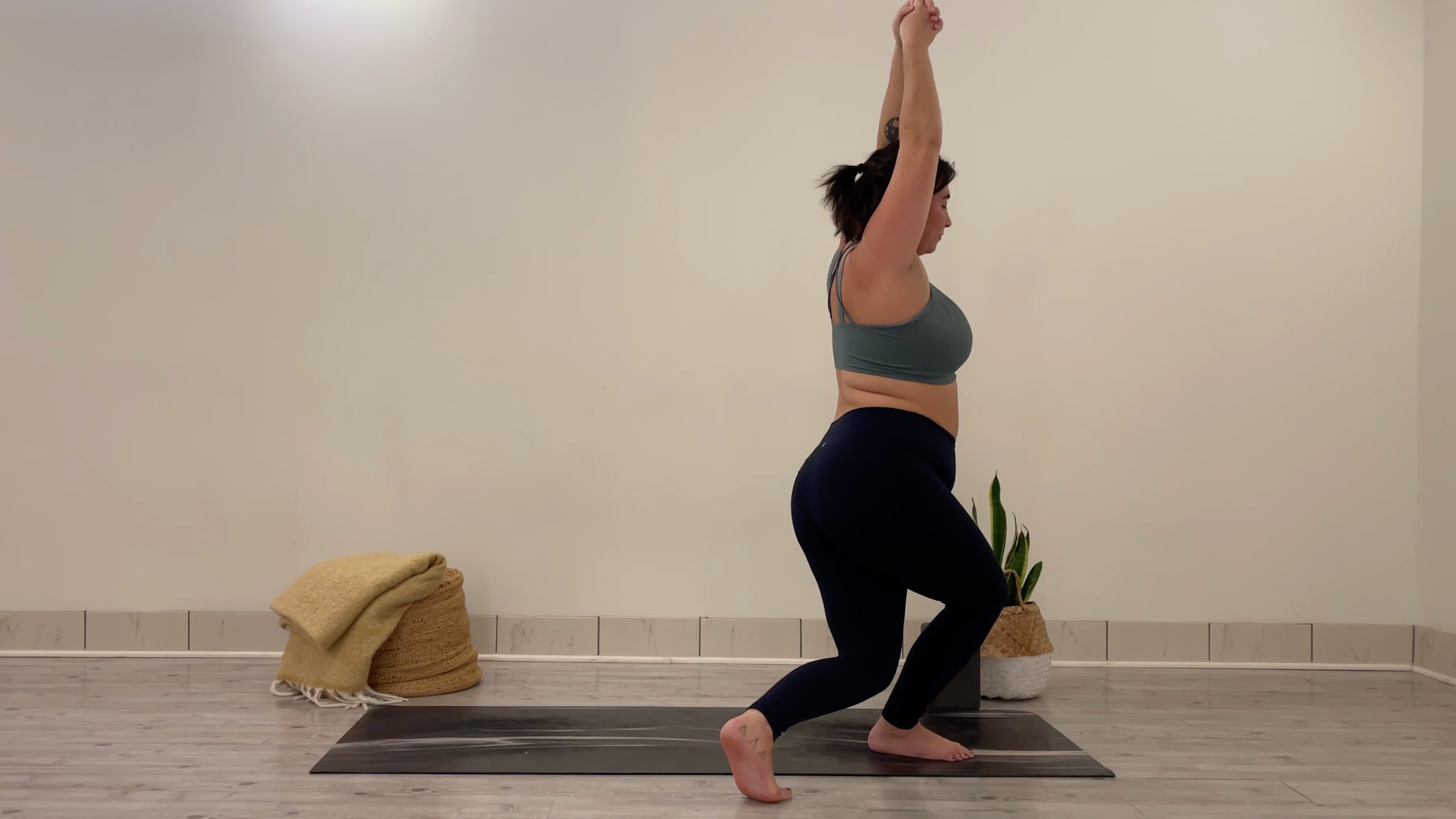 Teacher Taylor Lorenz in Stork Pose