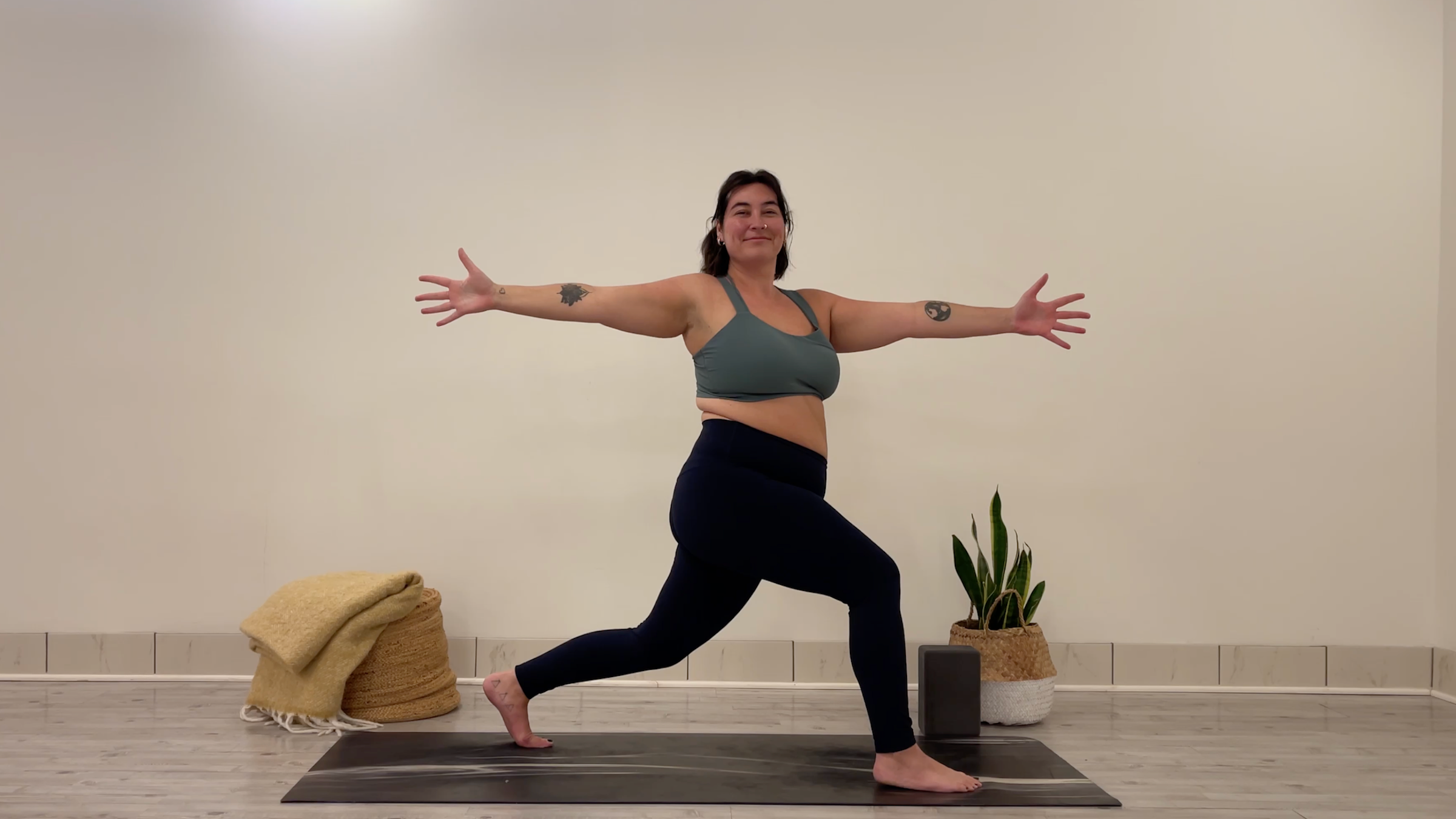 Teacher Taylor Lorenz in Twisting High Crescent Lunge