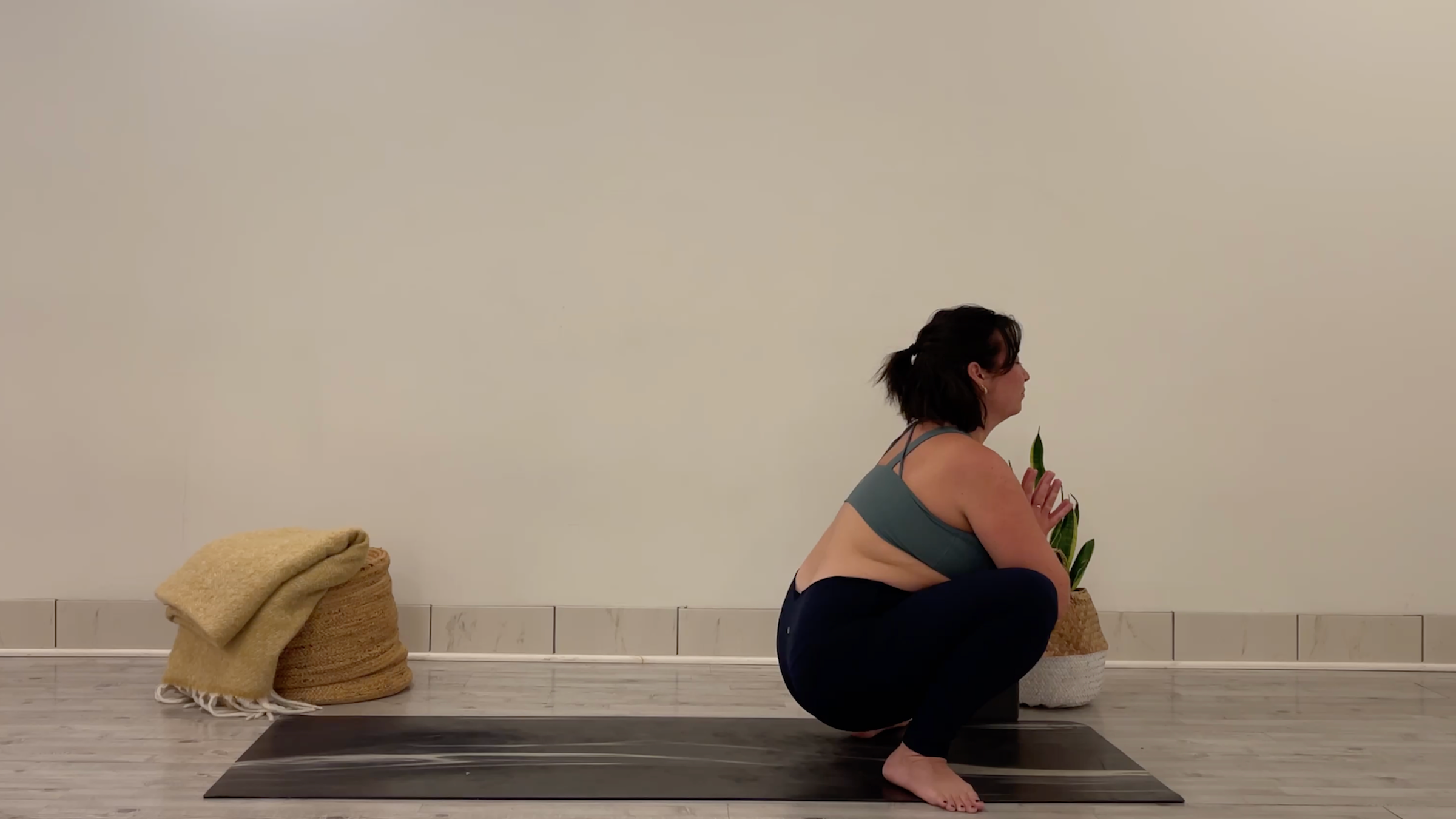 Teacher Taylor Lorenz in Yogi Squat
