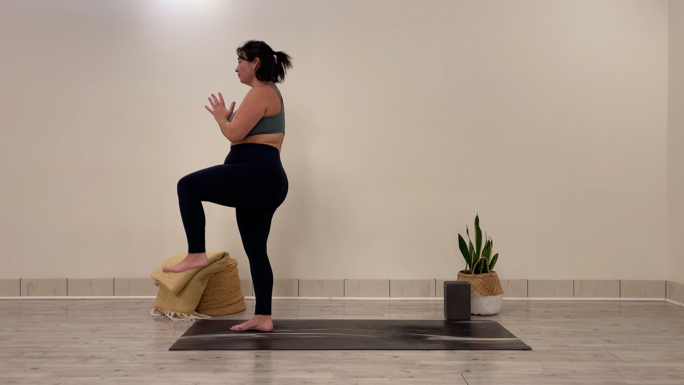 Yoga teacher Taylor Lorenz in Stork Pose, part of her morning yoga practice