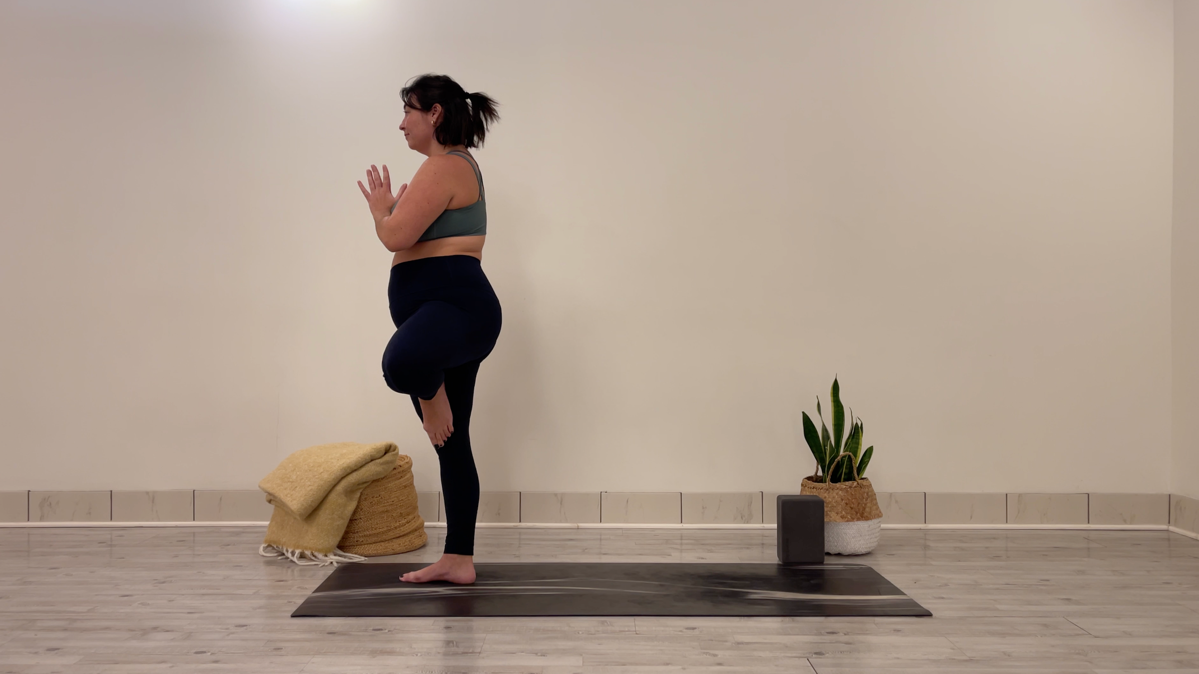 Teacher Taylor Lorenz in Tree Pose