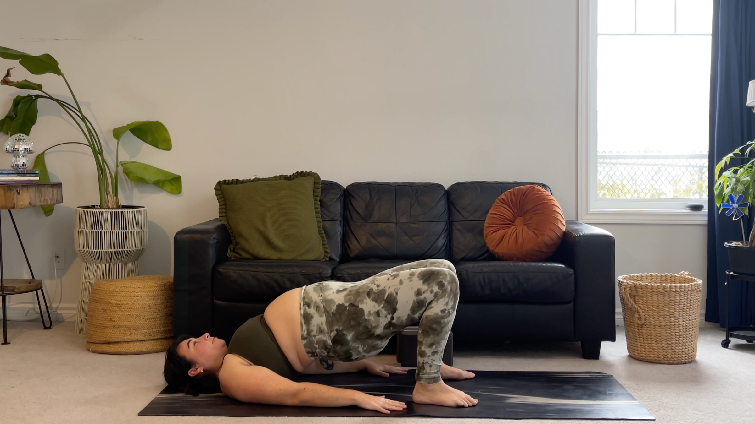 Teacher Taylor Lorenz in Bridge Pose