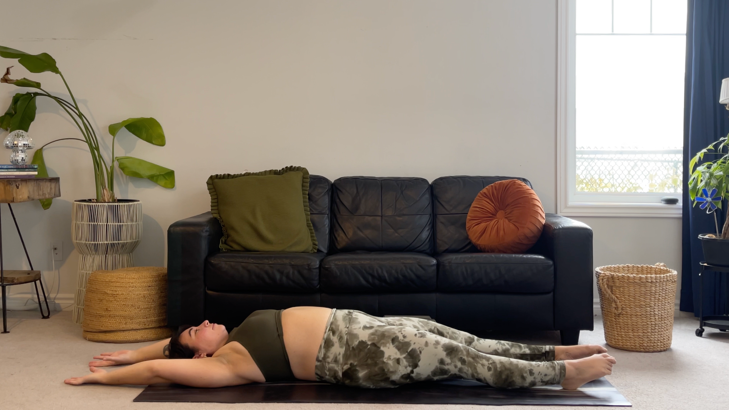 Yoga teacher Taylor Lorenz in Pencil Stretch, part of her new moon yoga practice