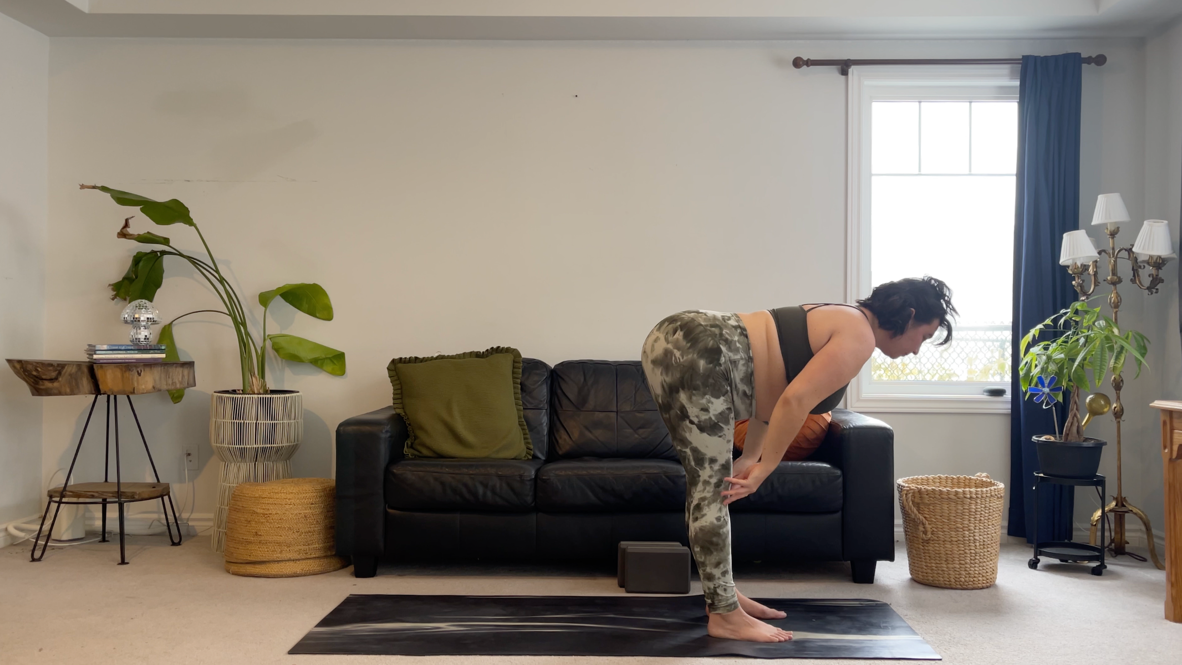 Yoga teacher Taylor Lorenz in Halfway Lift, part of her new moon yoga practice