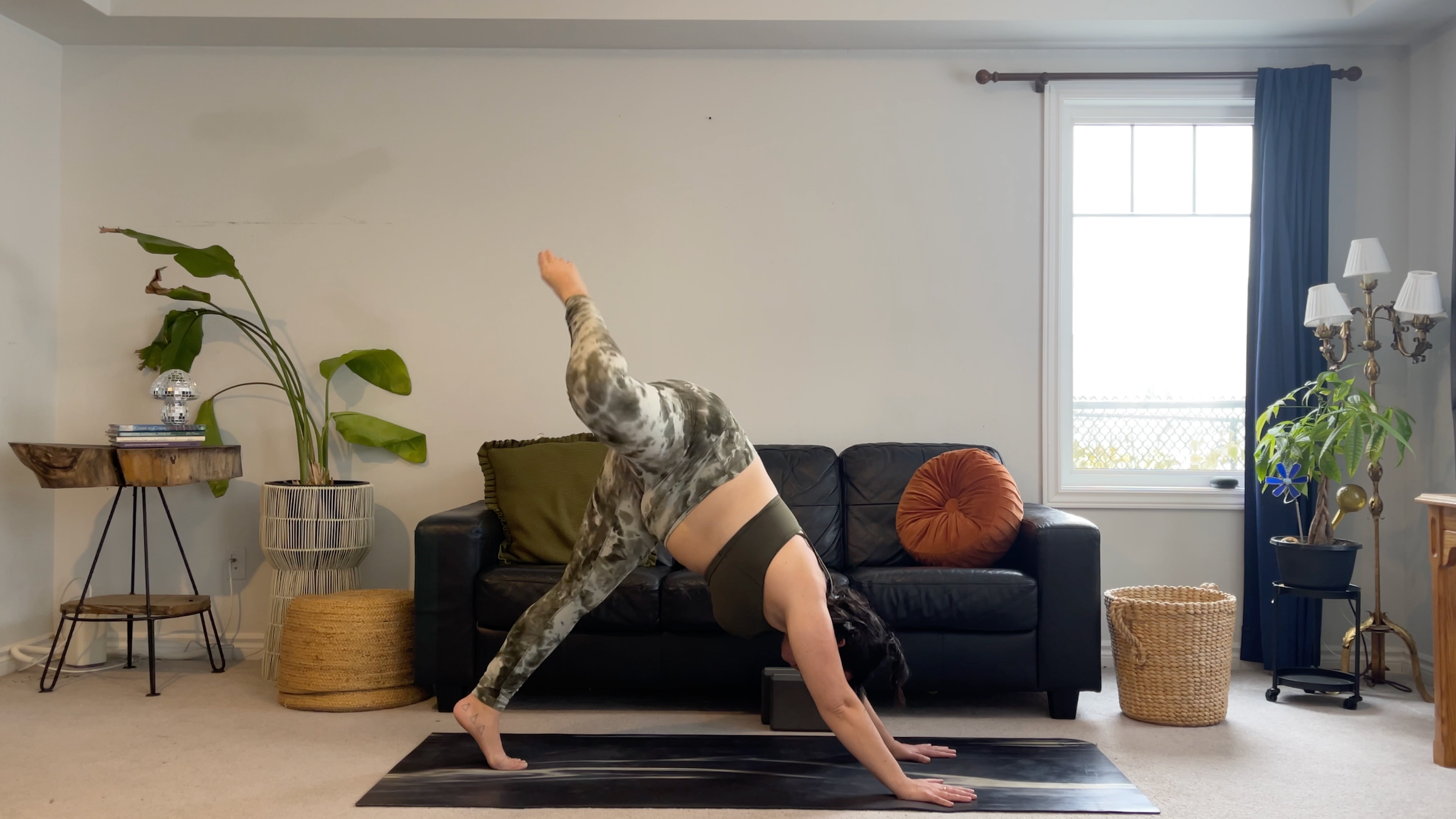 Yoga teacher Taylor Lorenz doing Hip Circles as part of her new moon yoga practice