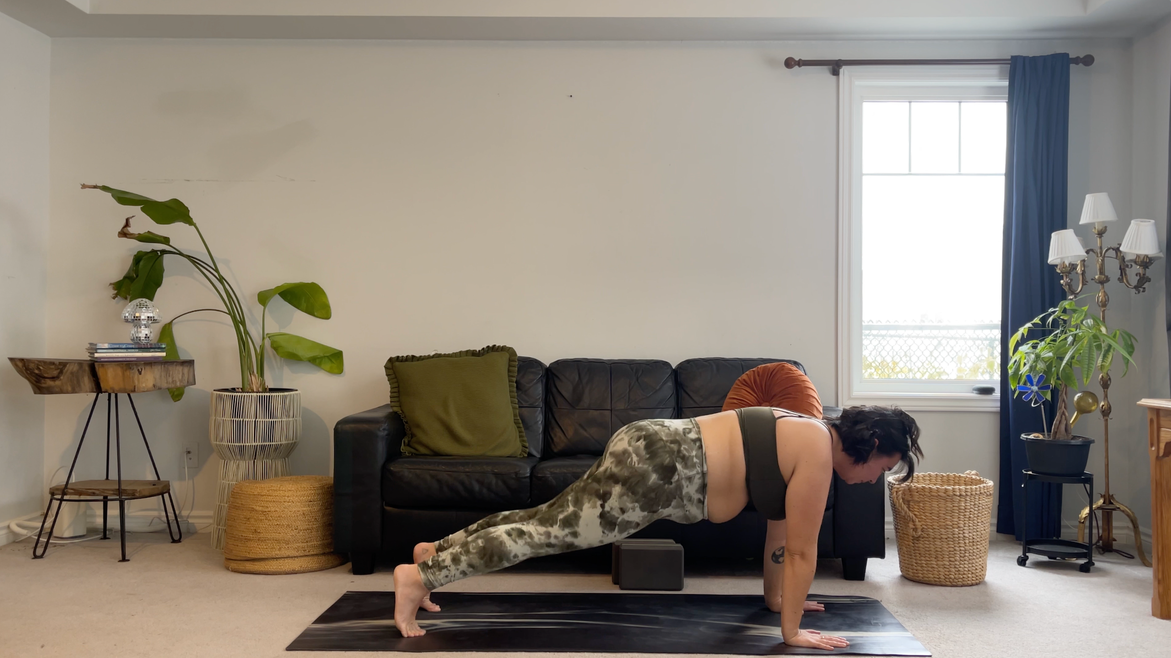 Teacher Taylor Lorenz in Plank Pose